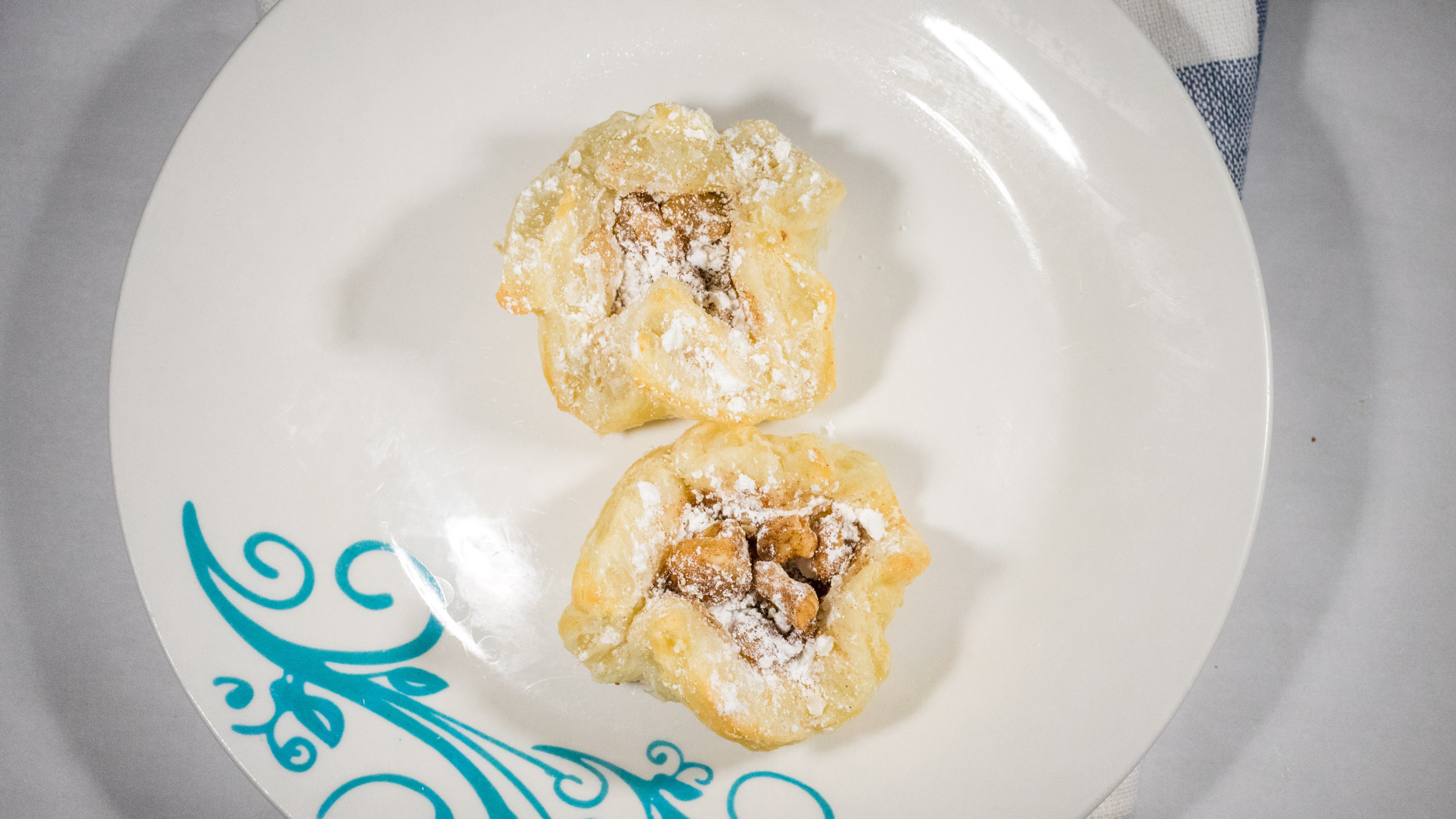 Order Walnuts & Cinnamon Puff Pastry - 2 Pieces food online from Lema Bakery store, Houston on bringmethat.com