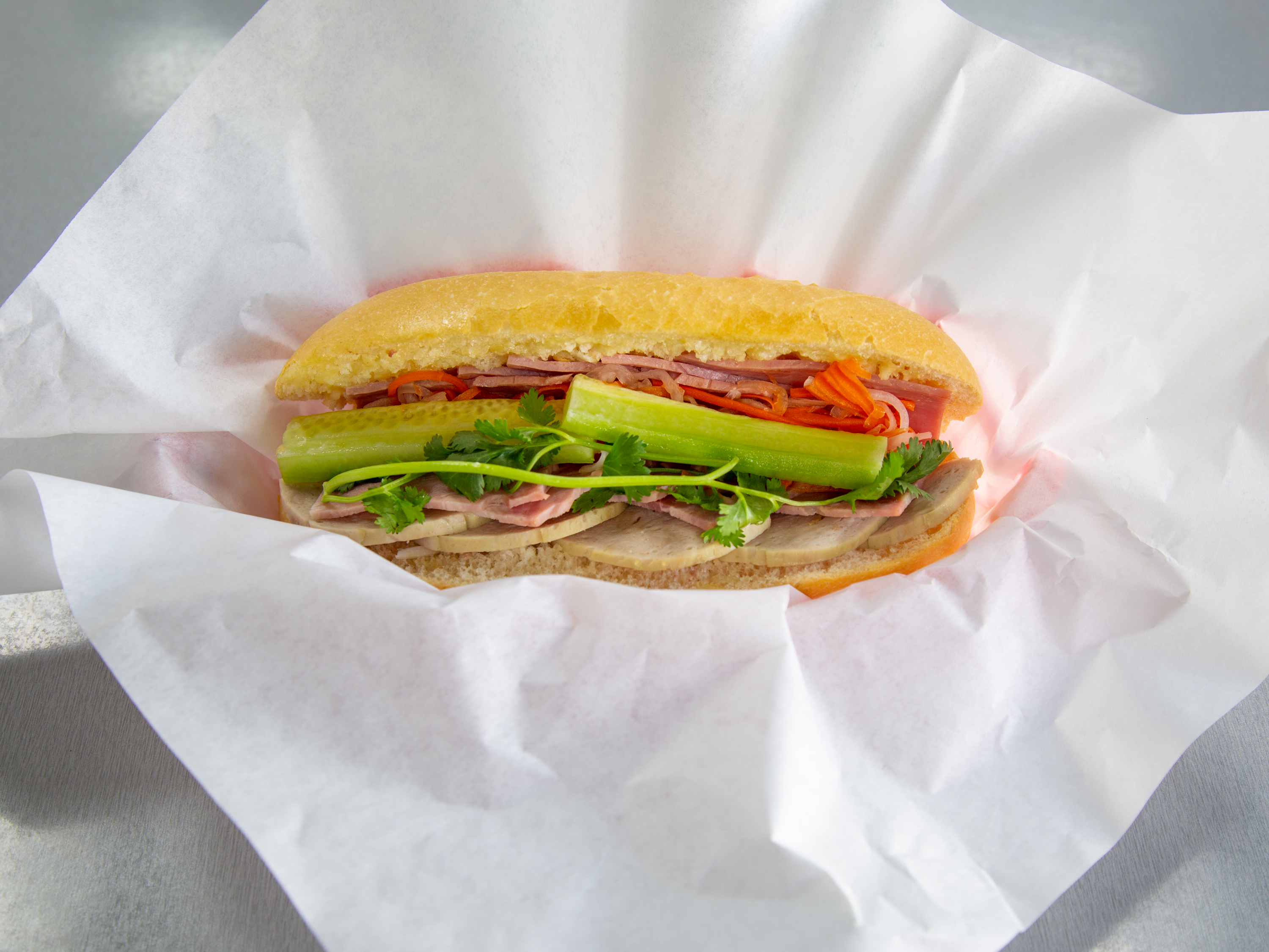 Order 1. Ham and Steam Pork Sandwich food online from Boba Tea & Coffee store, Redding on bringmethat.com