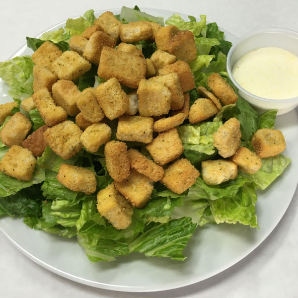 Order Caesar Salad food online from The Slice Pizza store, San Francisco on bringmethat.com