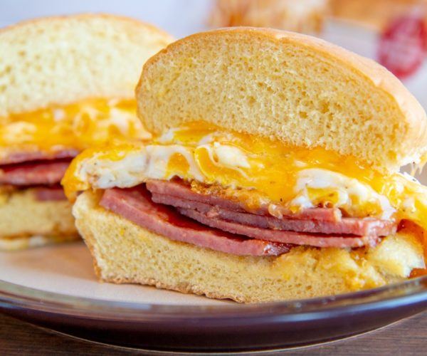 Order 2 Eggs Any Style Sandwich with Sausage food online from Mediterranean Grill And Bar store, New York on bringmethat.com