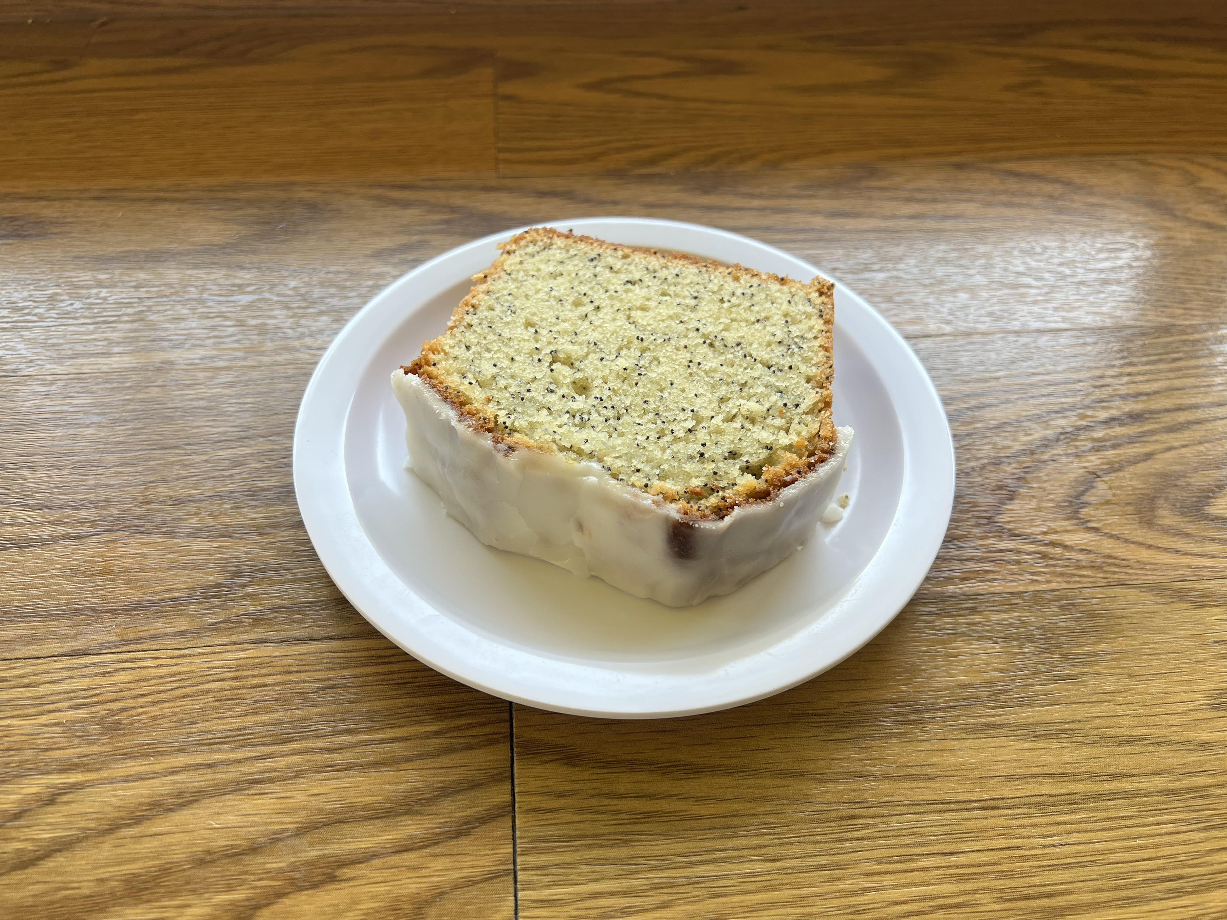 Order *NEW* Lemon Poppyseed Cake food online from Courageous Bakery & Cafe store, Oak Park on bringmethat.com