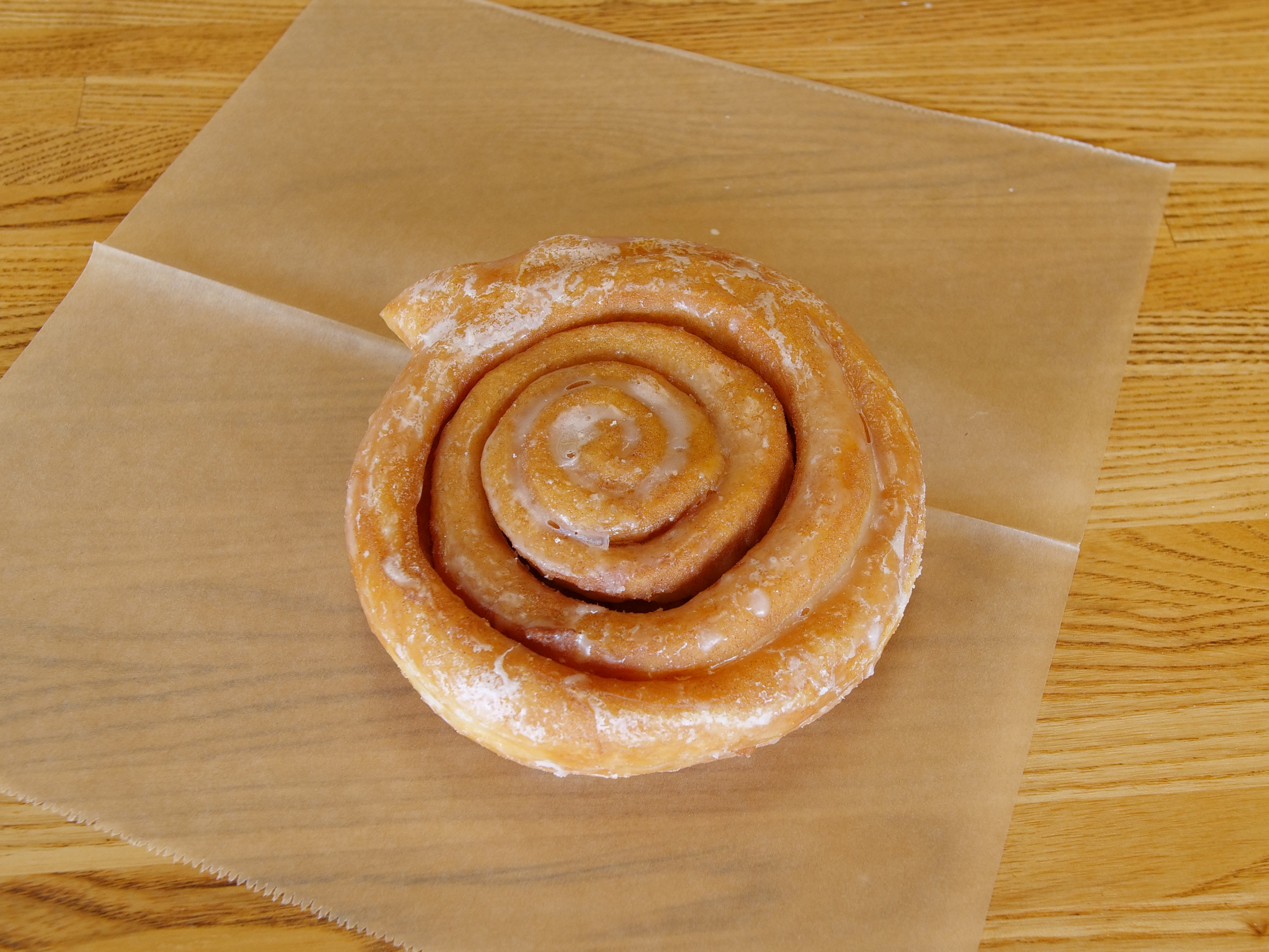 Order Cinnamon Roll a la Carte food online from The Donut House store, Aurora on bringmethat.com