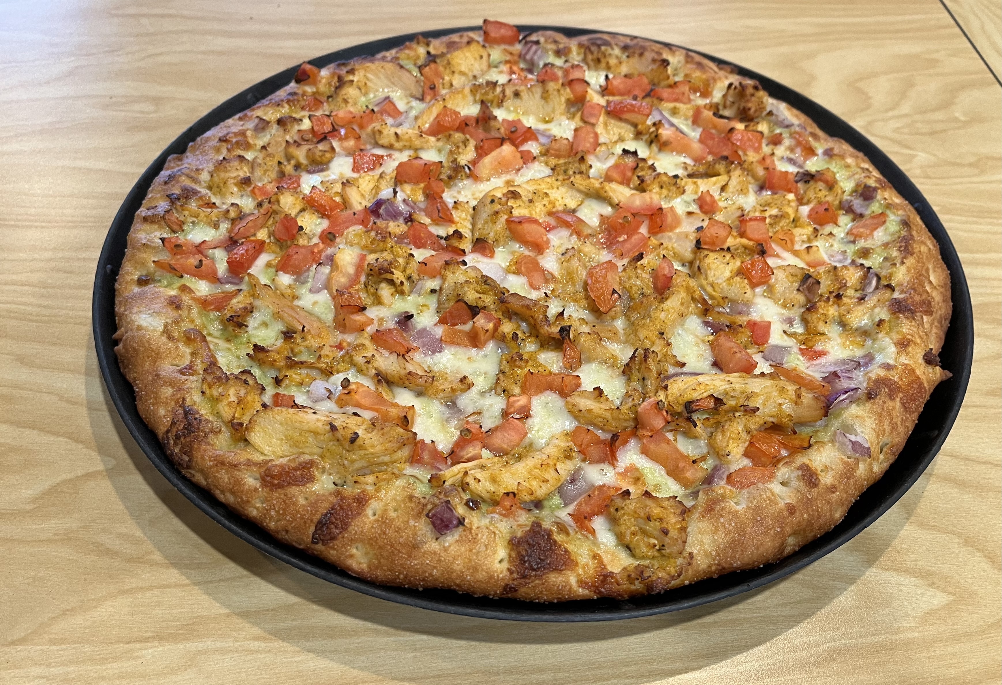 Order Butter Chicken Pizza food online from Namaste Pizza store, Pleasanton on bringmethat.com