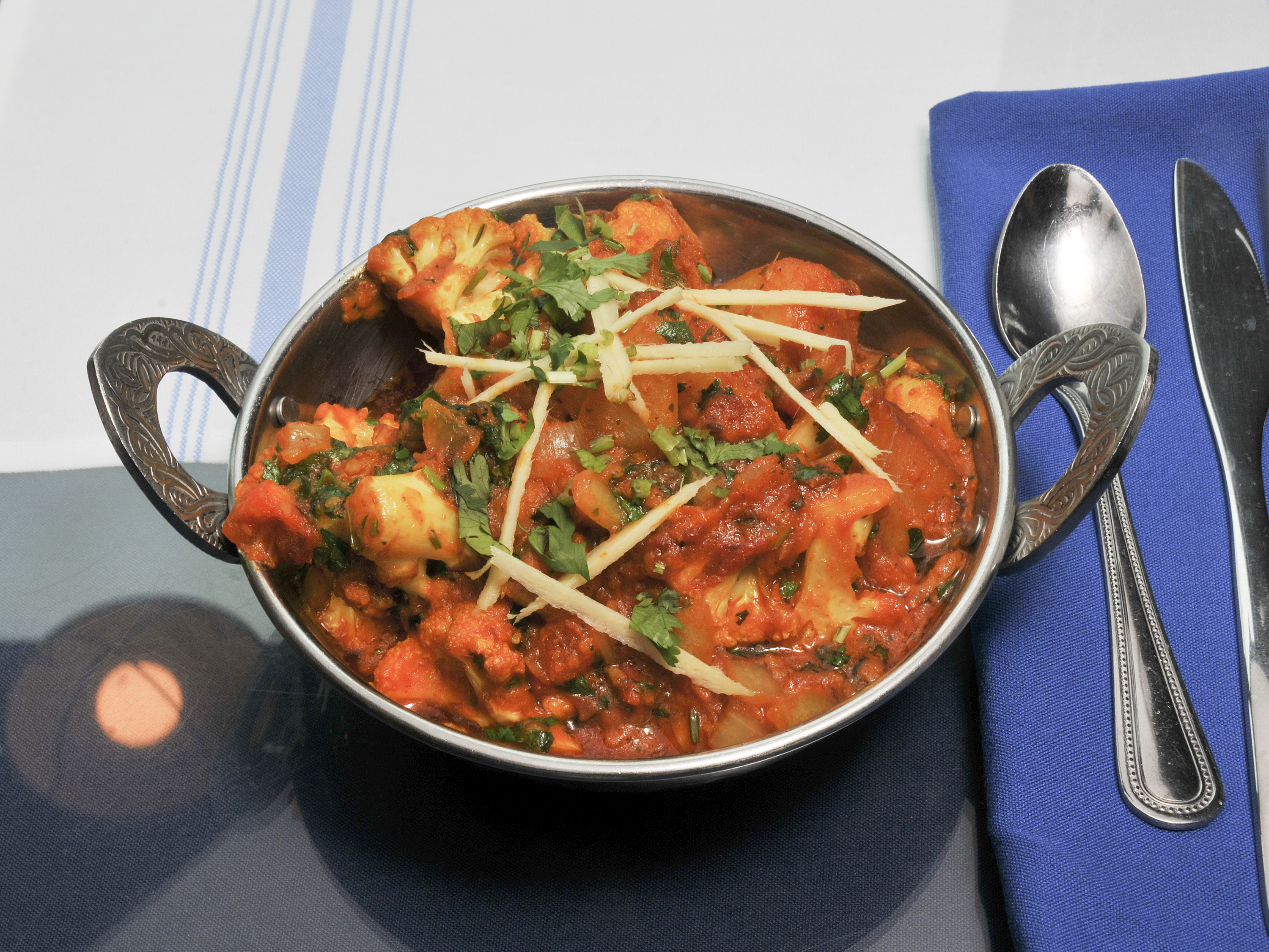 Order Aloo Gobi Masala food online from NaanStop Indian Cuisine store, Durham on bringmethat.com