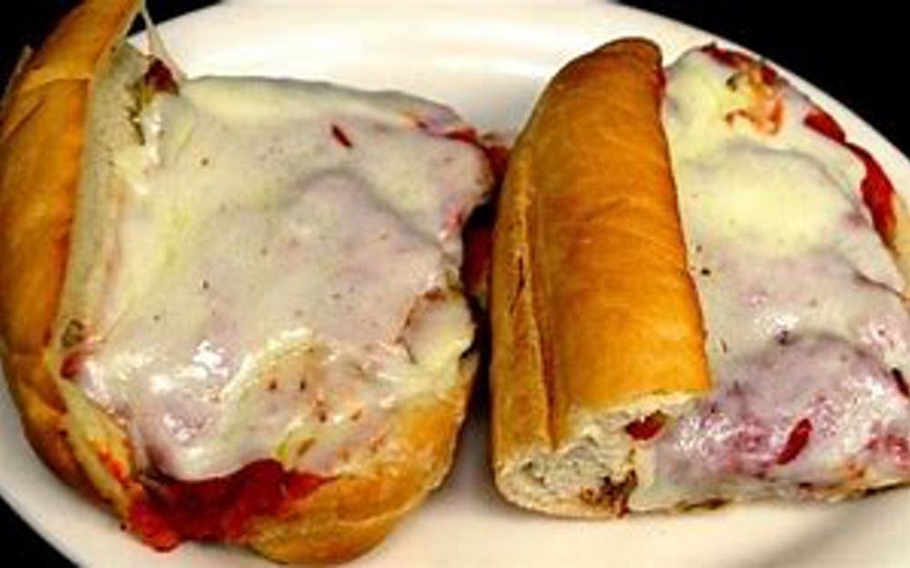 Order Veal Parmigiana Sub - 7" food online from Pino's Pizzeria store, Easton on bringmethat.com
