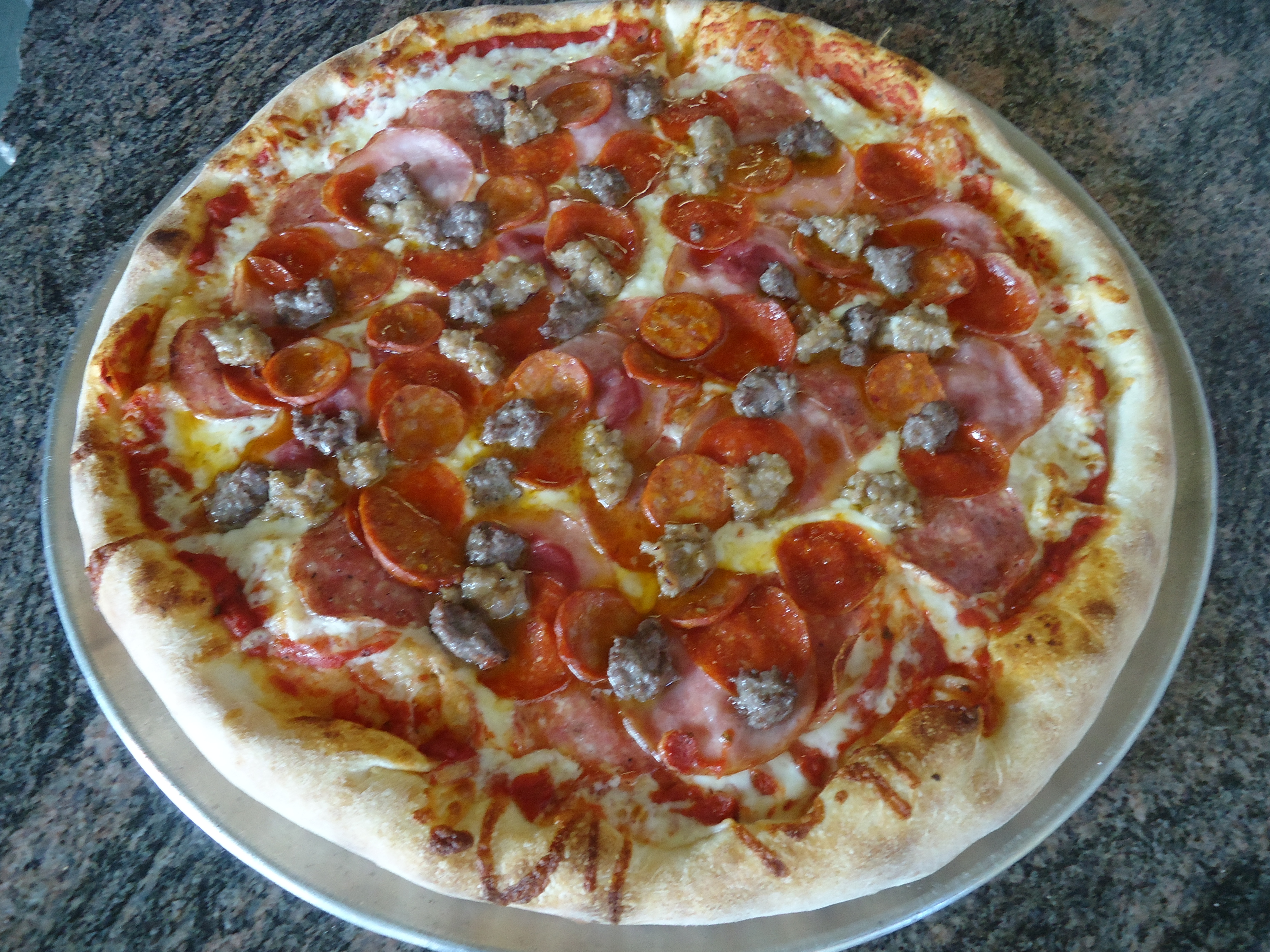 Order Meat Lover Pizza food online from Supreme pizza store, San Francisco on bringmethat.com