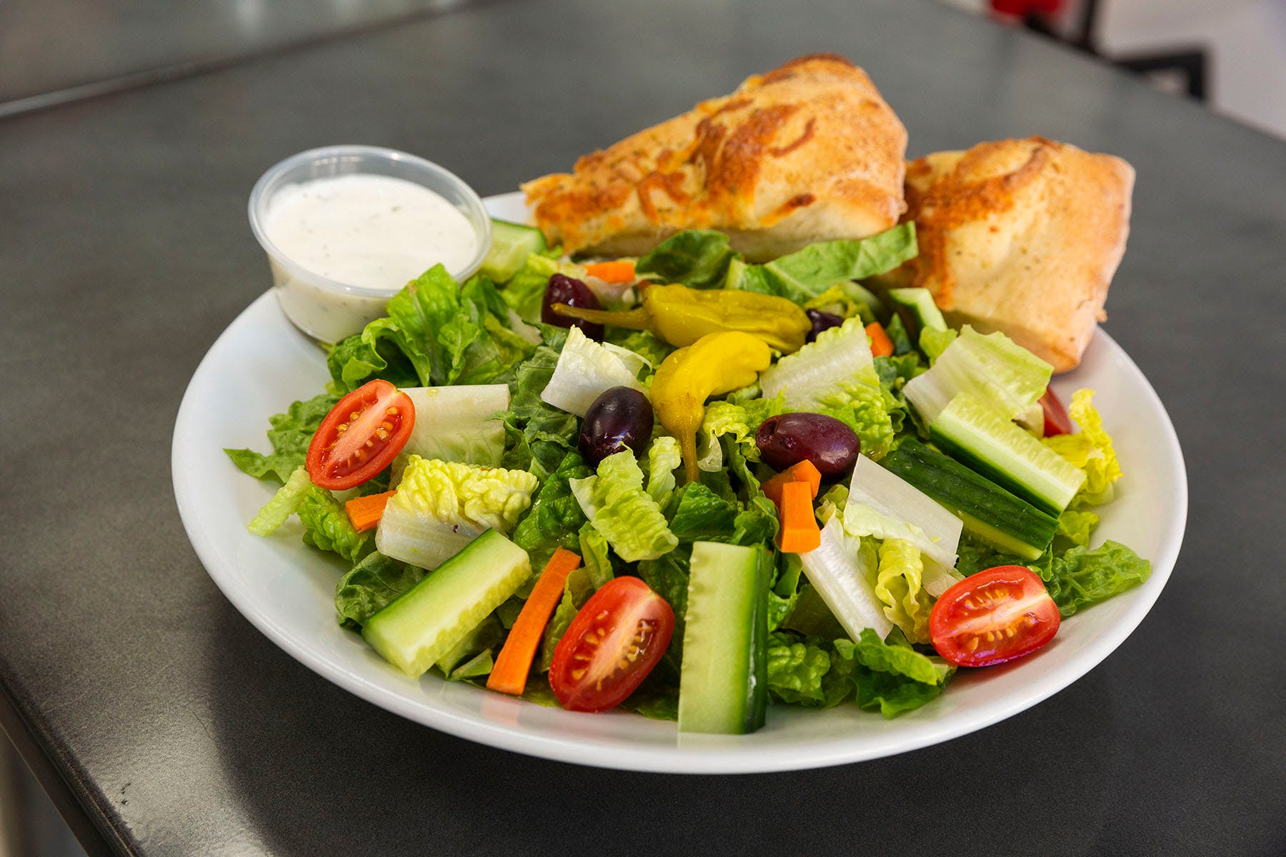 Order Garden Salad - Salads food online from College Pizza store, Boston on bringmethat.com