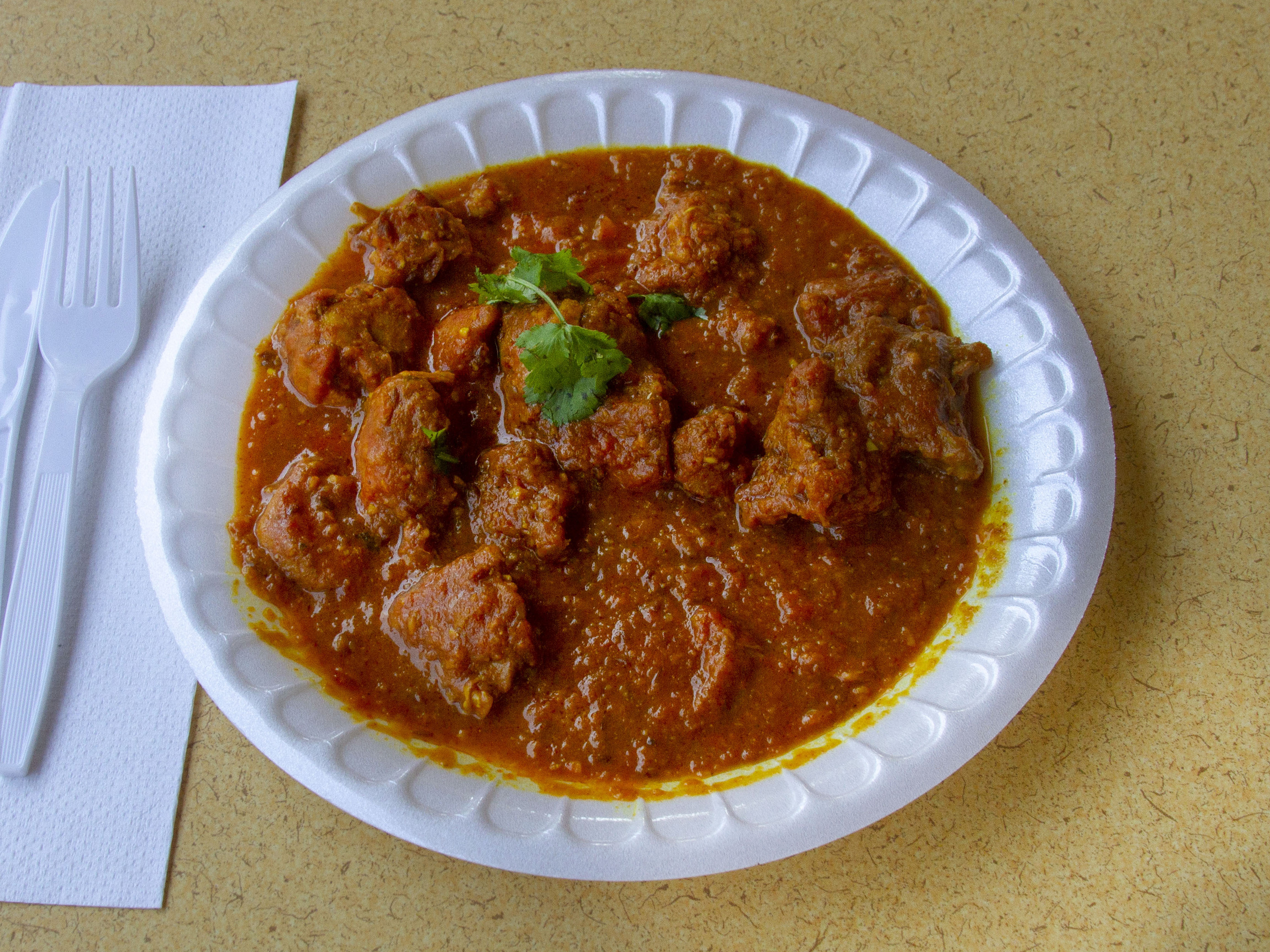 Order Chicken Curry food online from Samosa Hut And Spices store, Fresno on bringmethat.com