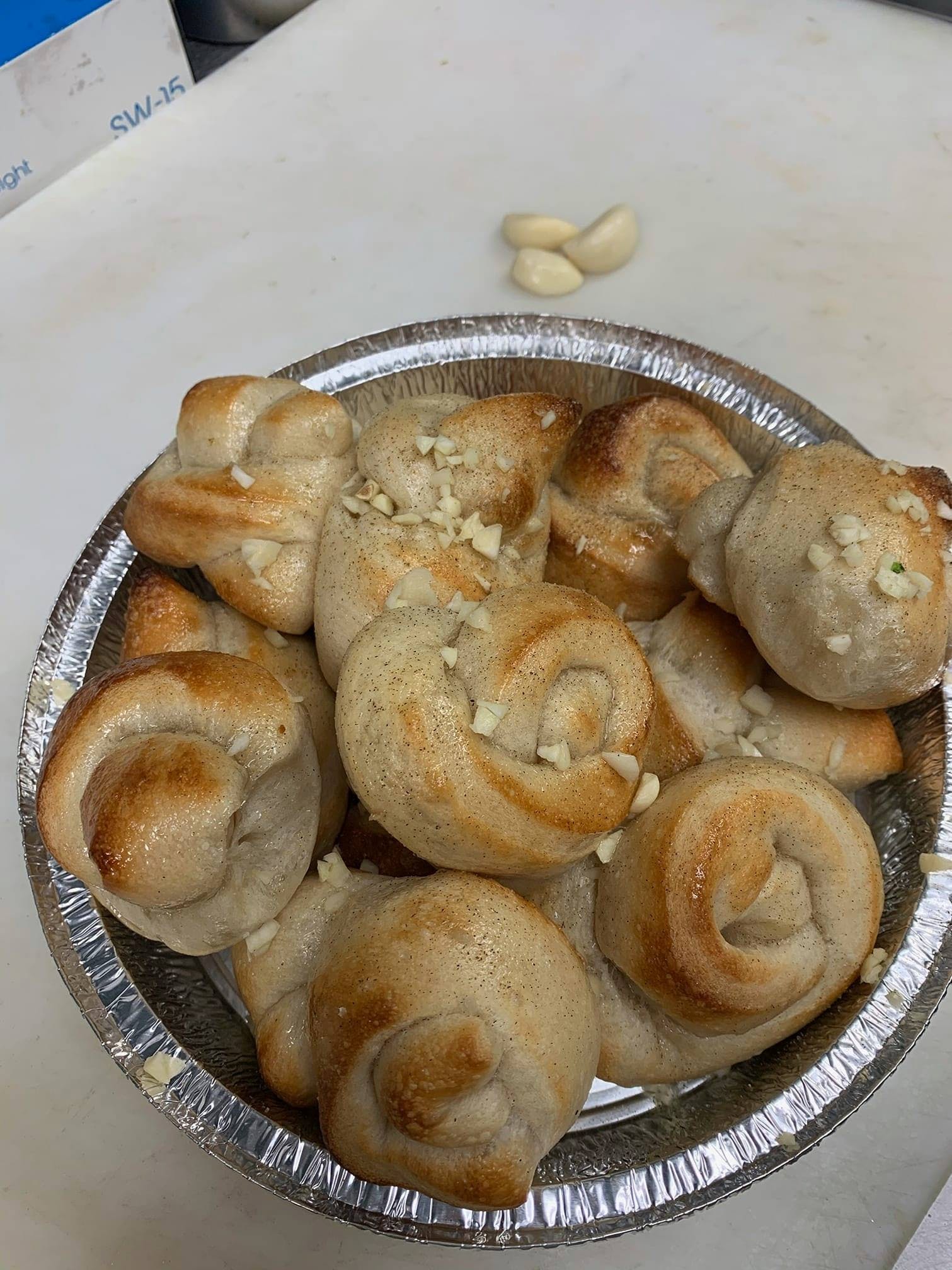 Order Garlic Knots - 6 Pieces food online from Livingston Steak & Pizza store, Livingston on bringmethat.com
