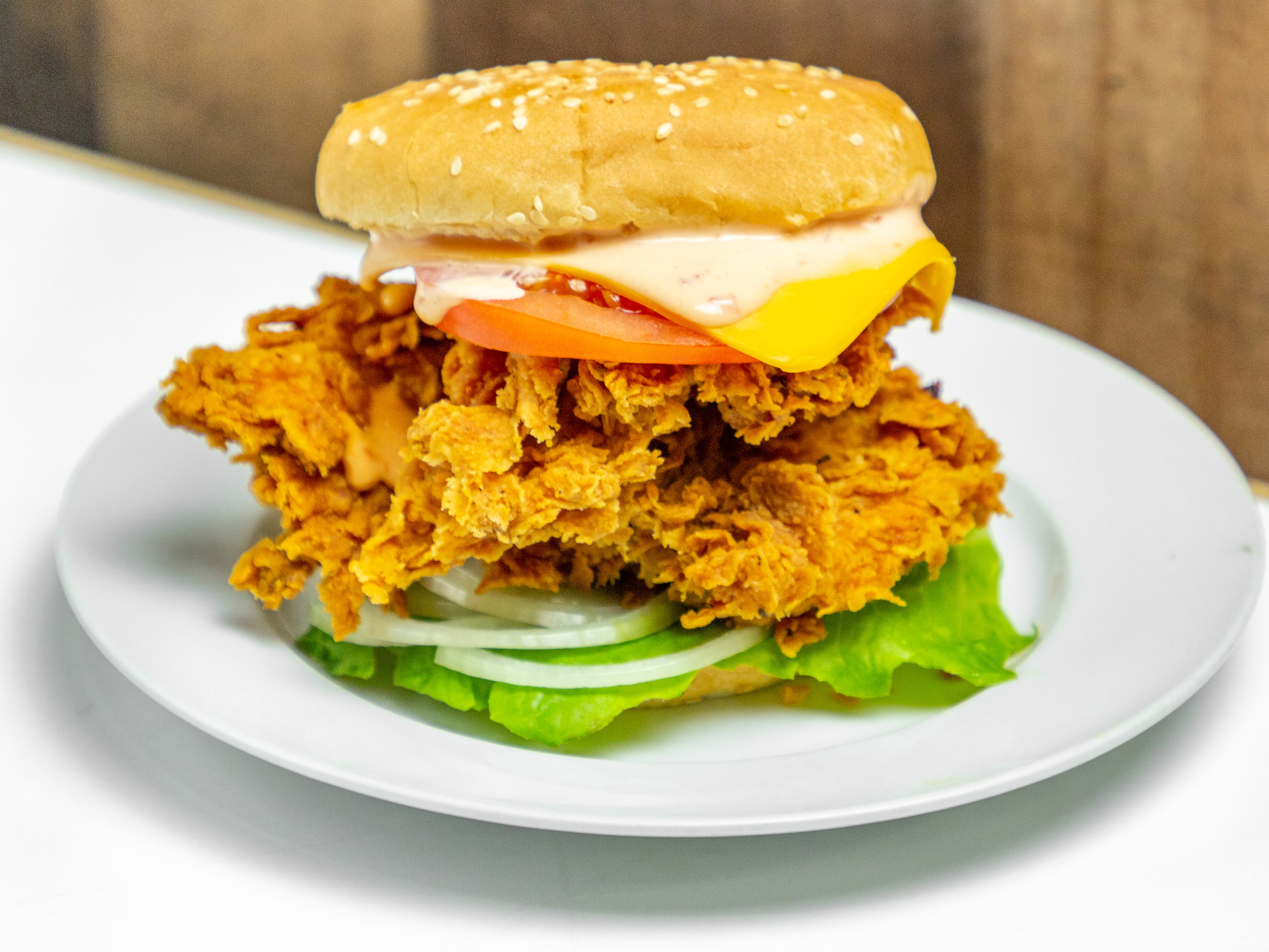 Order Zinger Burger food online from Al-Madinah Restaurant store, Watervliet on bringmethat.com