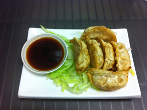 Order 6 Piece Gyoza food online from Simply Thai store, Fort Collins on bringmethat.com