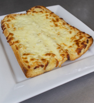 Order Garlic Bread food online from Zayna's Pizza store, Milwaukee on bringmethat.com