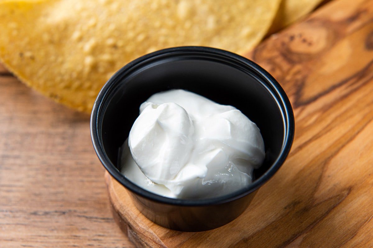 Order Sour Cream food online from On The Border store, Grandville on bringmethat.com