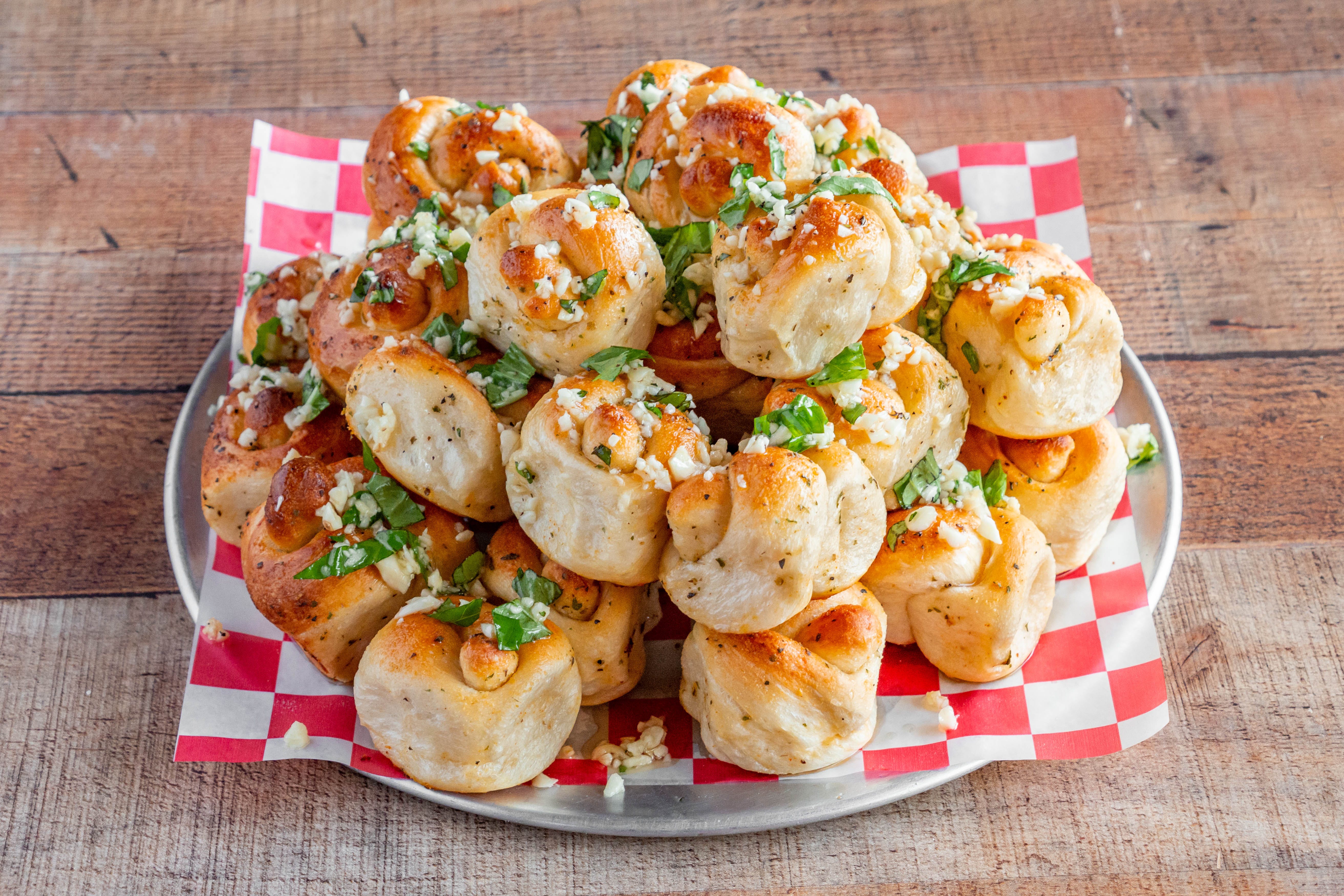 Order Garlic Knots - 5 Pieces food online from Fratelli Pizzeria & Cafe store, Bethlehem on bringmethat.com