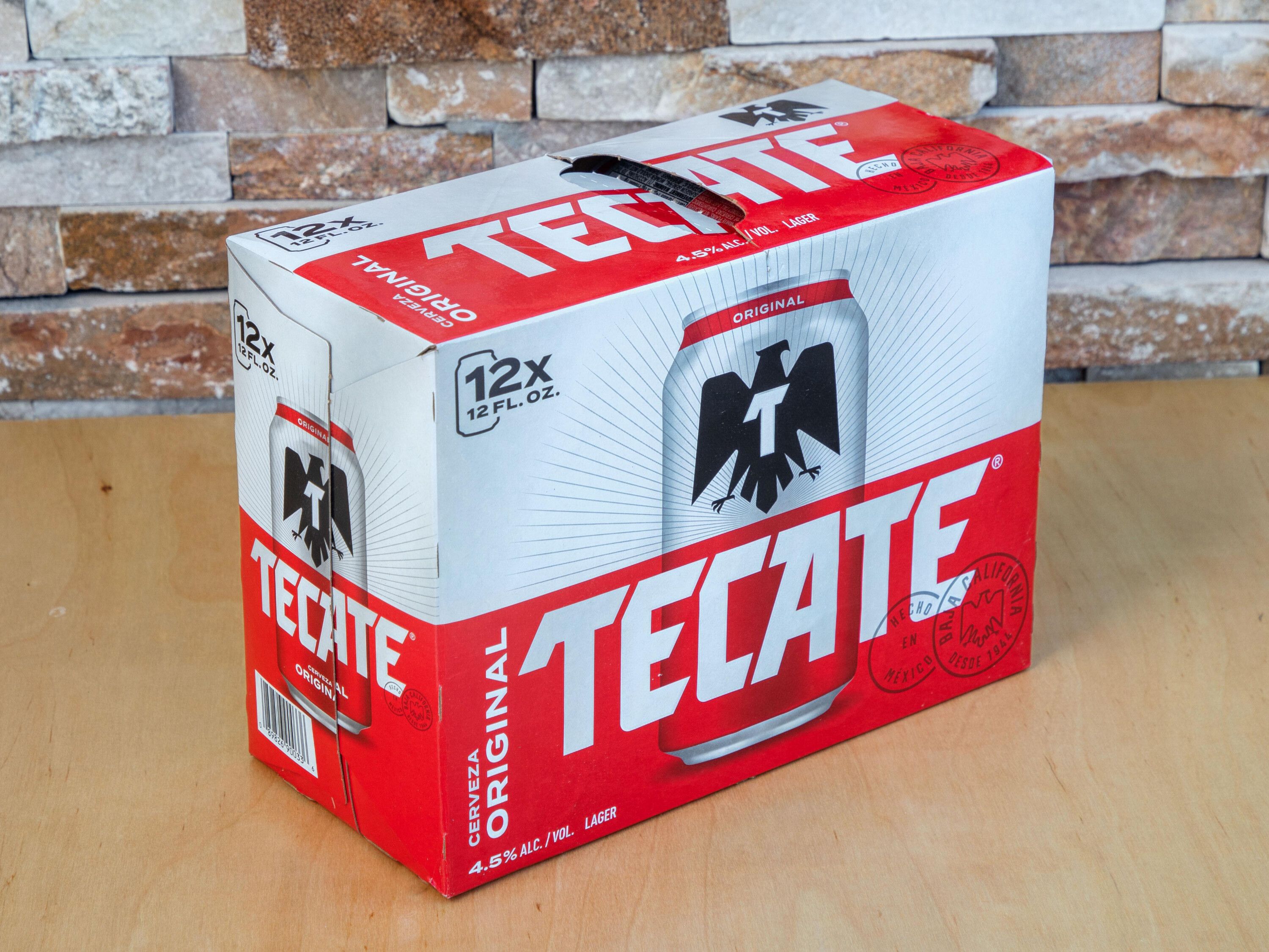 Order 12 Canned Tecate Mexican Beer food online from Sk Food Mart store, Mesa on bringmethat.com