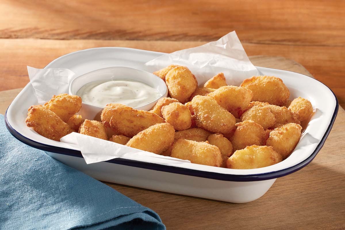 Order White Cheddar Cheese Bites food online from Cracker Barrel store, Snellville on bringmethat.com