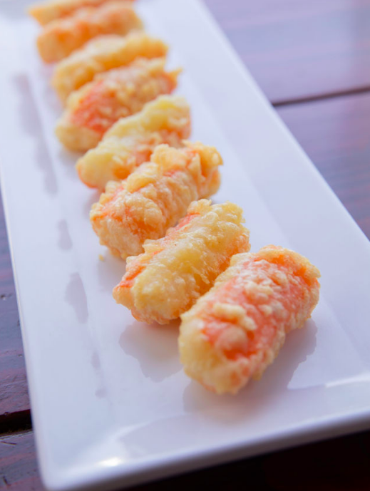 Order Kani Poppers food online from Meshuga 4 Sushi - N. La Brea Ave. store, Los Angeles on bringmethat.com