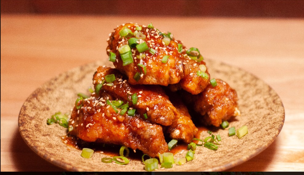 Order Garlic Soy Chicken Wings food online from Zutto Japanese American Pub store, New York on bringmethat.com