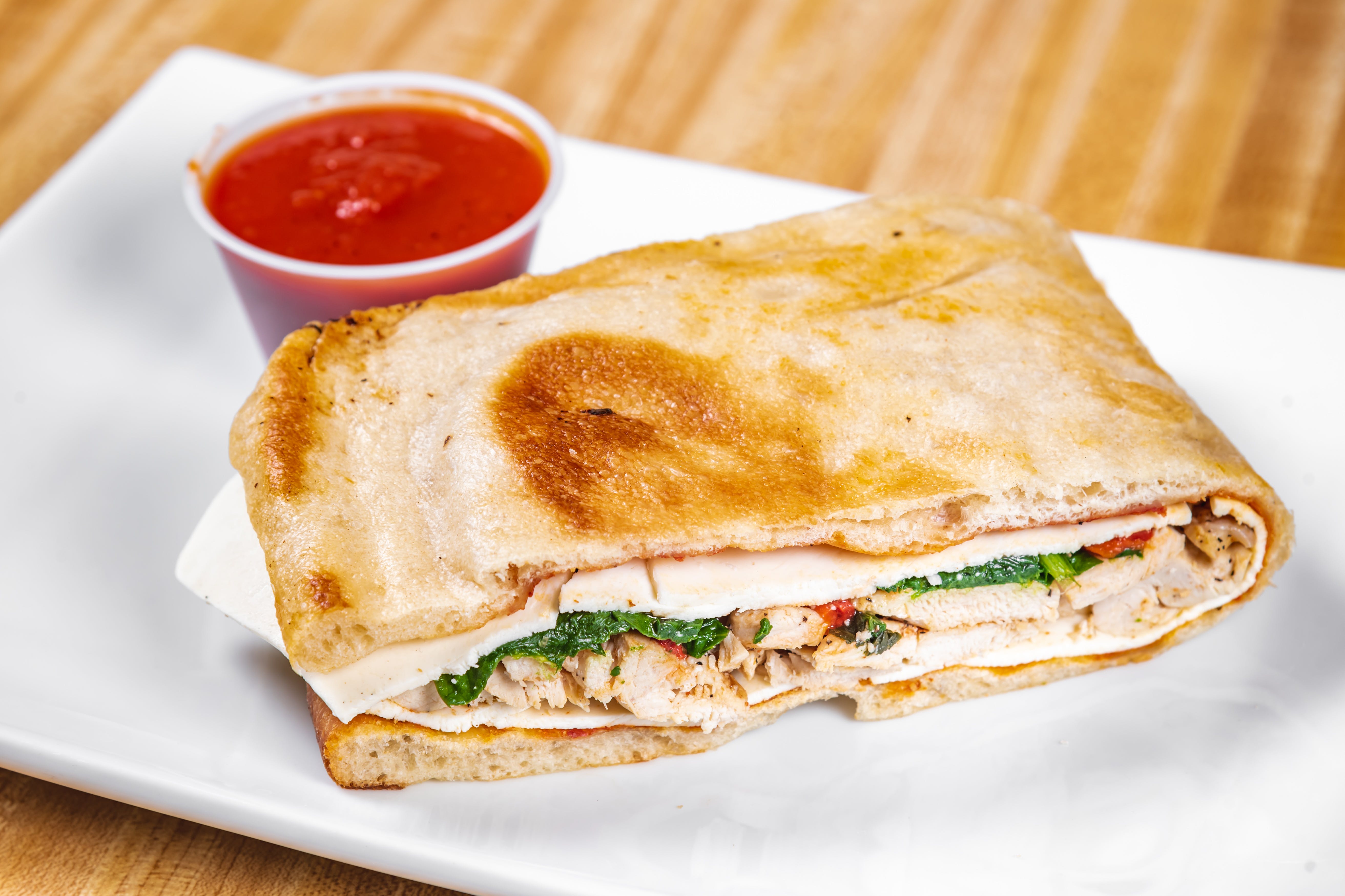 Order Grilled Chicken Panini - Panini food online from Riuniti Pizzeria & Restaurant store, Carteret on bringmethat.com