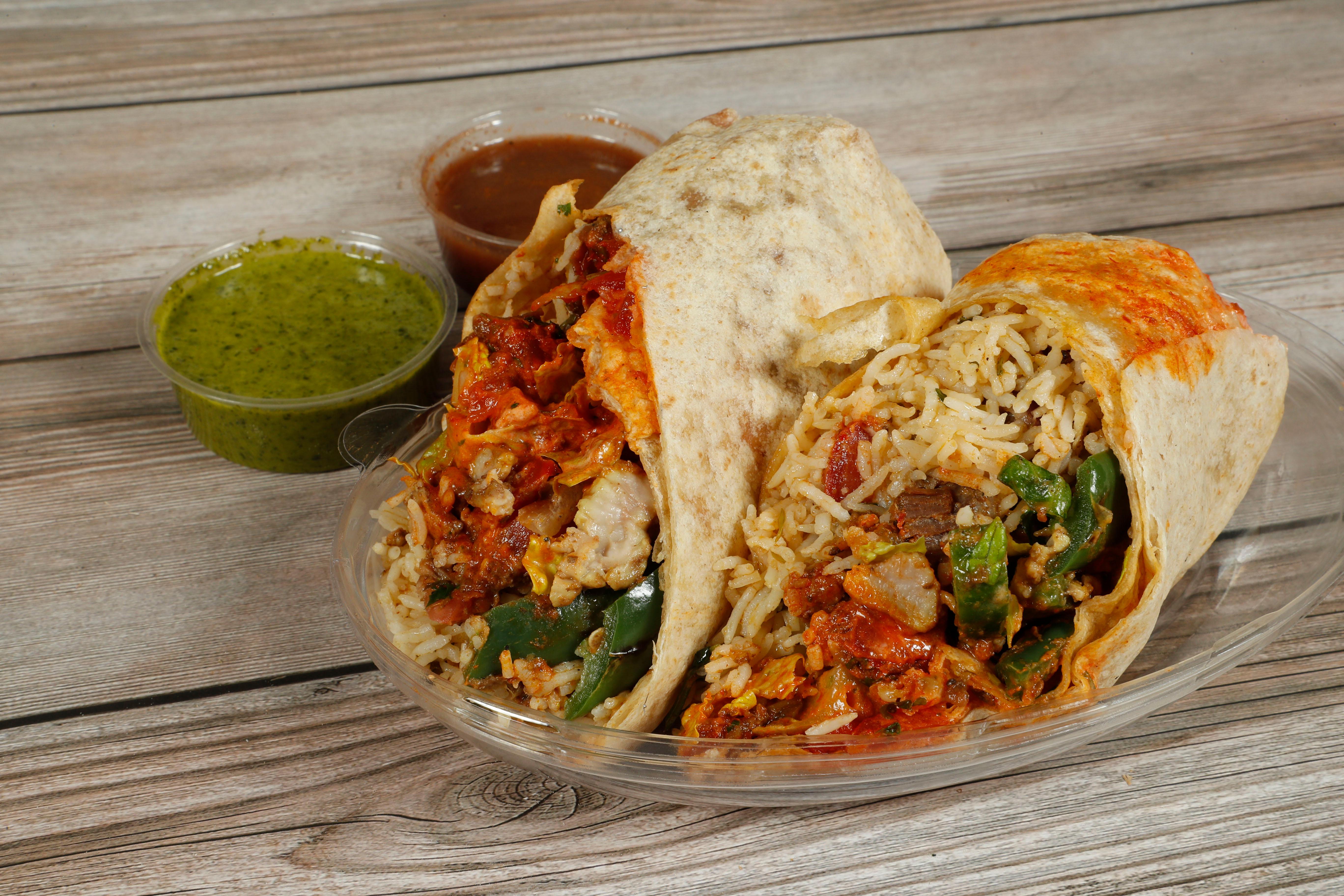 Order Saag Burrito food online from Sam & Curry store, San Jose on bringmethat.com