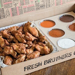Order Baked Wings Tailgate Bundle - 50 Pieces food online from Fresh Brothers store, Los Angeles on bringmethat.com