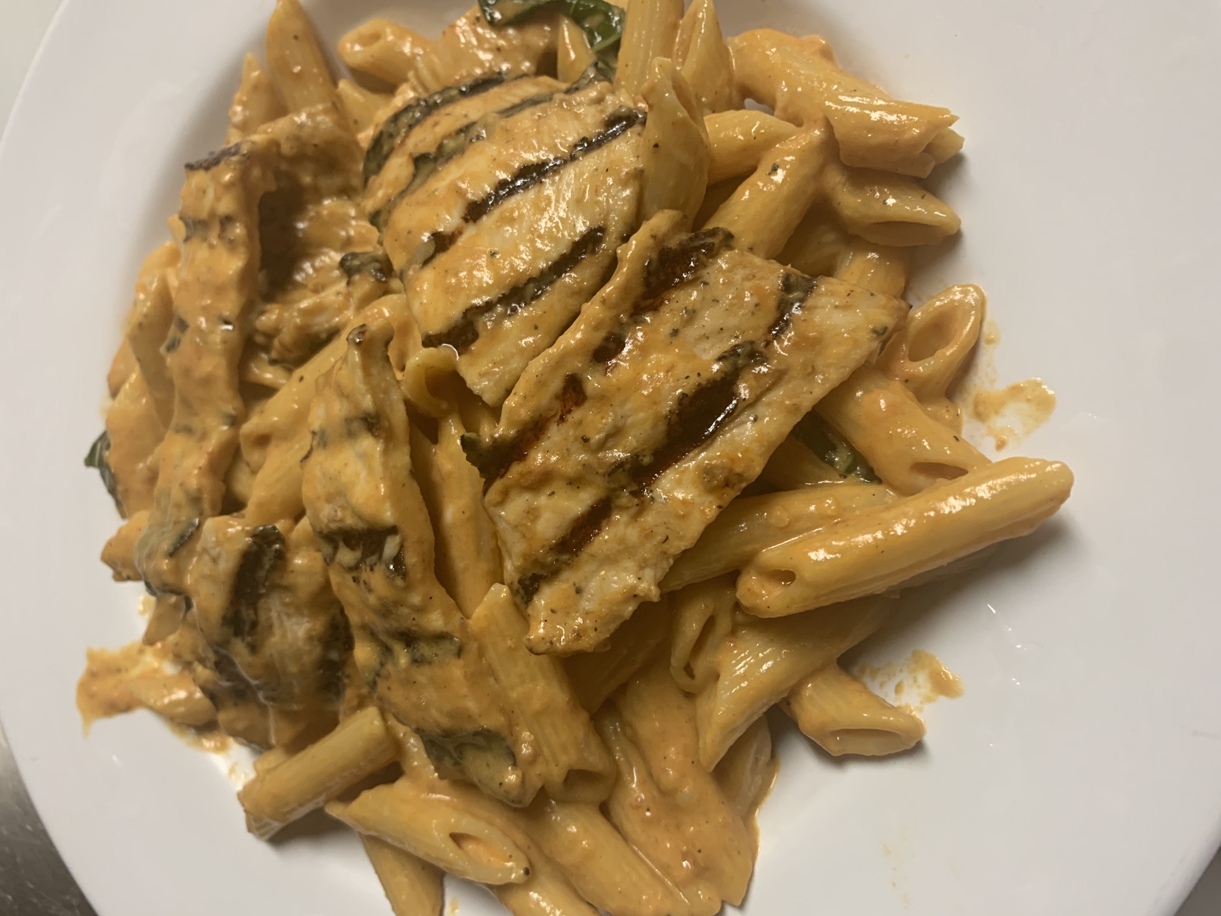 Order Penne a la Vodka with Grilled Chicken food online from Taste of italy store, Corona on bringmethat.com