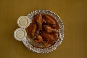 Order Wings food online from Massino's Pizzeria store, Aurora on bringmethat.com