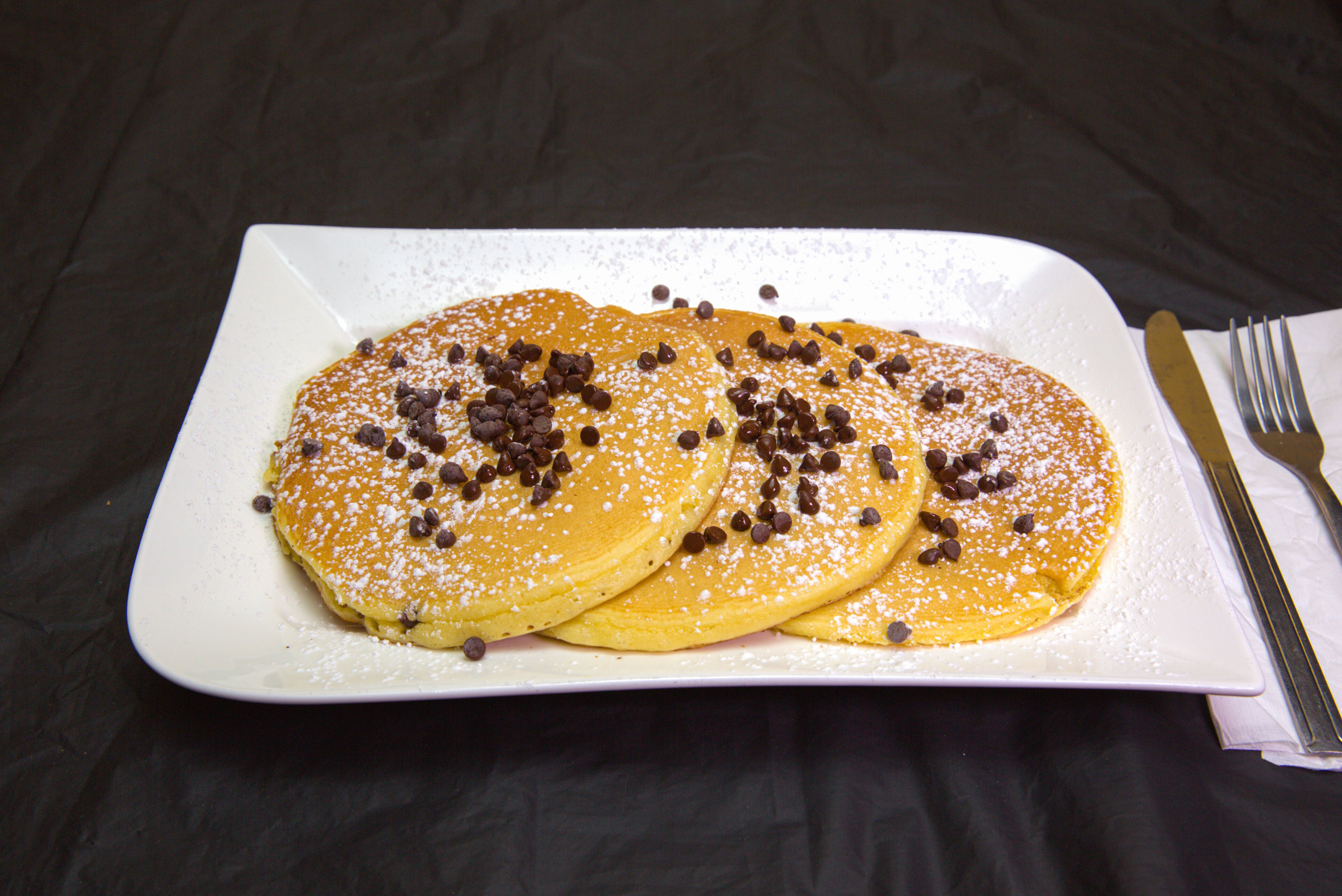 Order Chocolate Chip Pancakes Breakfast - 3 Pieces food online from Limeport Deli & Cafe store, Coopersburg on bringmethat.com