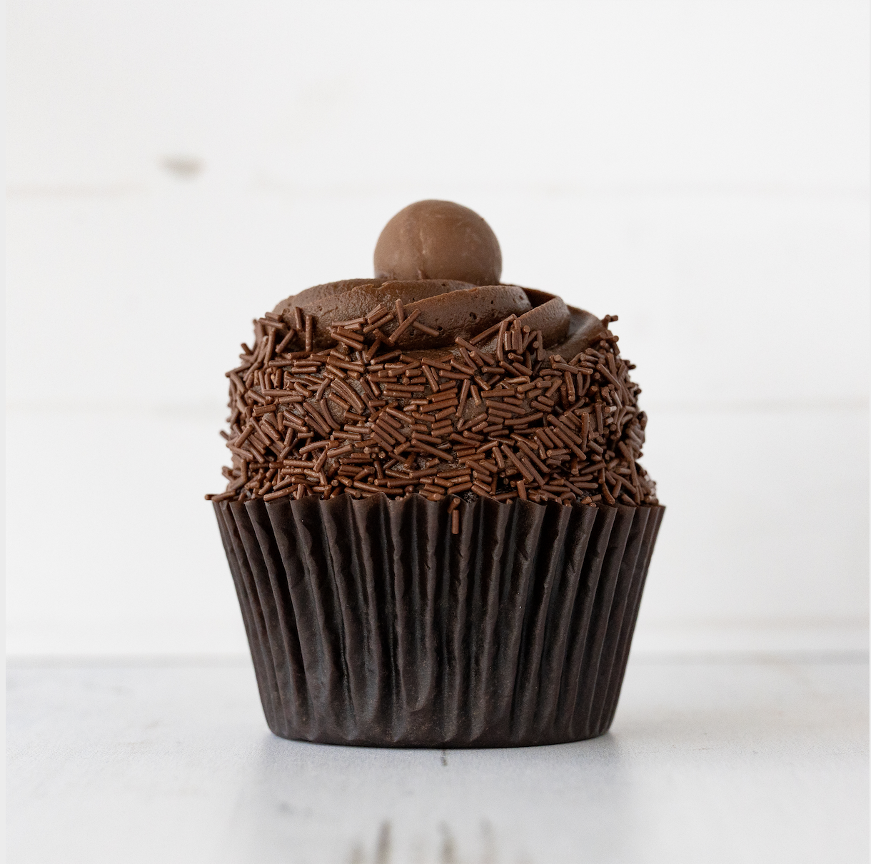 Order Death By Chocolate Cupcake food online from Cute Cakes store, Escondido on bringmethat.com