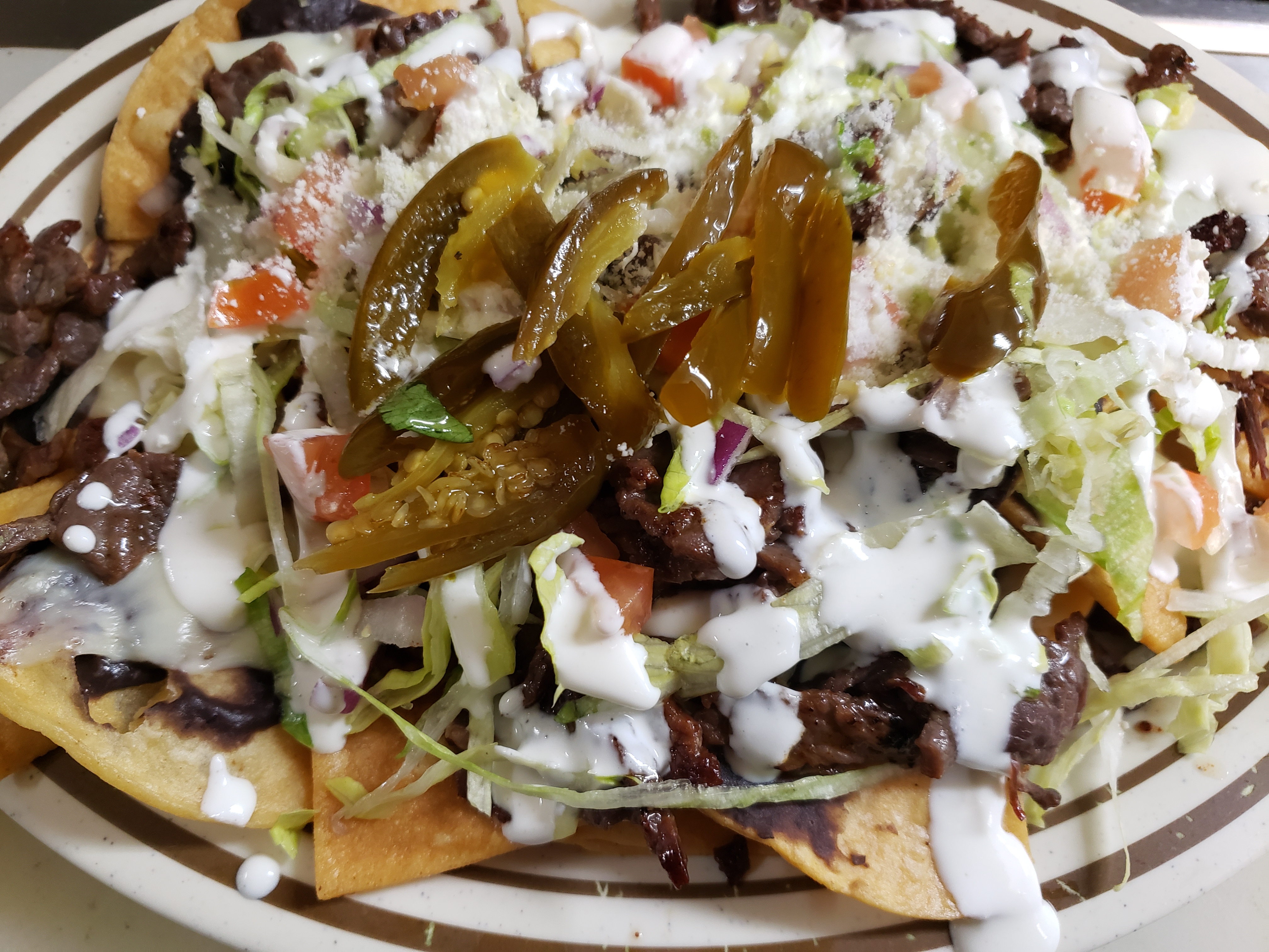 Order Cecina Nachos food online from La Comadre Restaurant And Bakery store, Woodhaven on bringmethat.com
