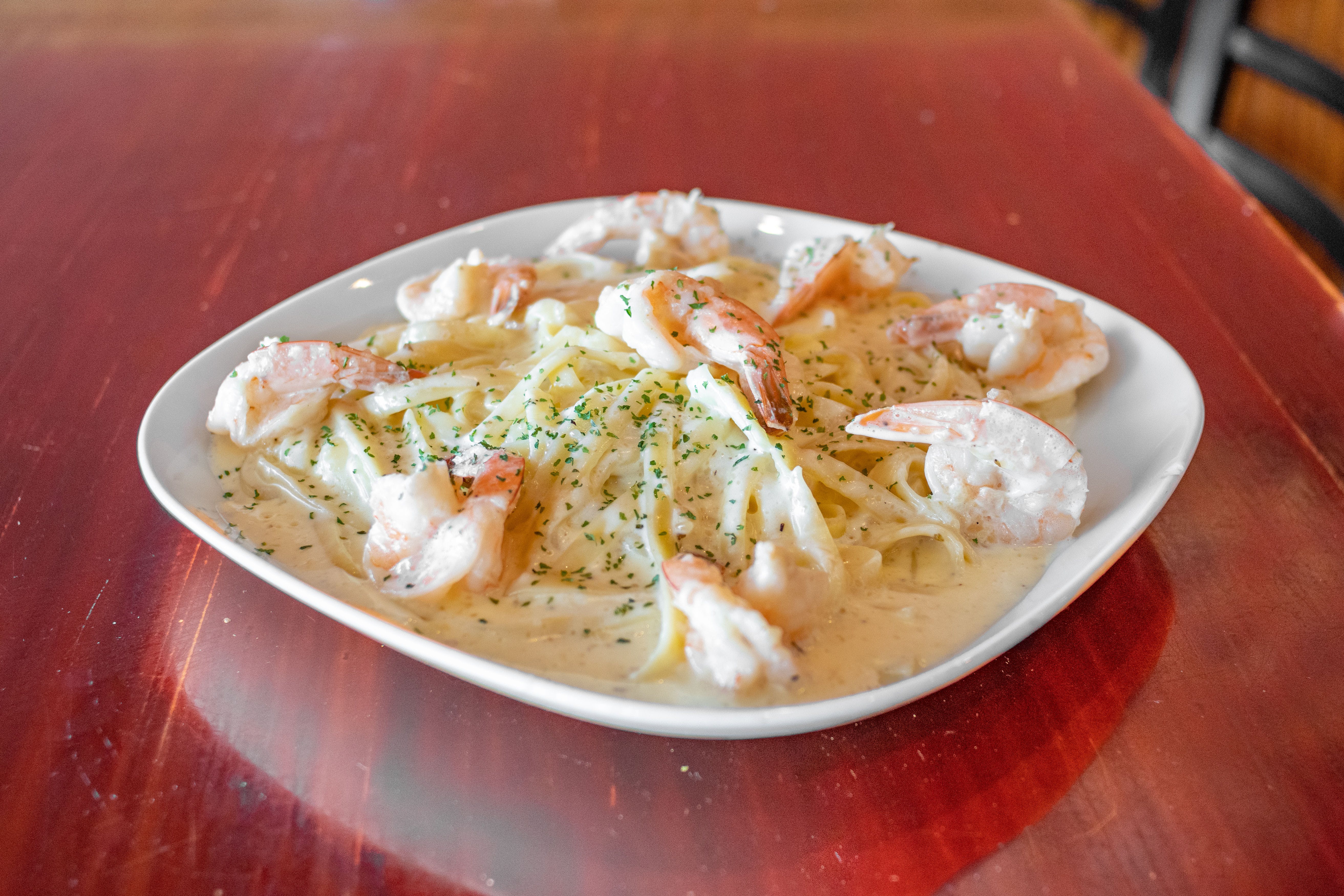 Order Pasta Alfredo with Shrimp - Dinner food online from Julia's Pizza store, Orlando on bringmethat.com