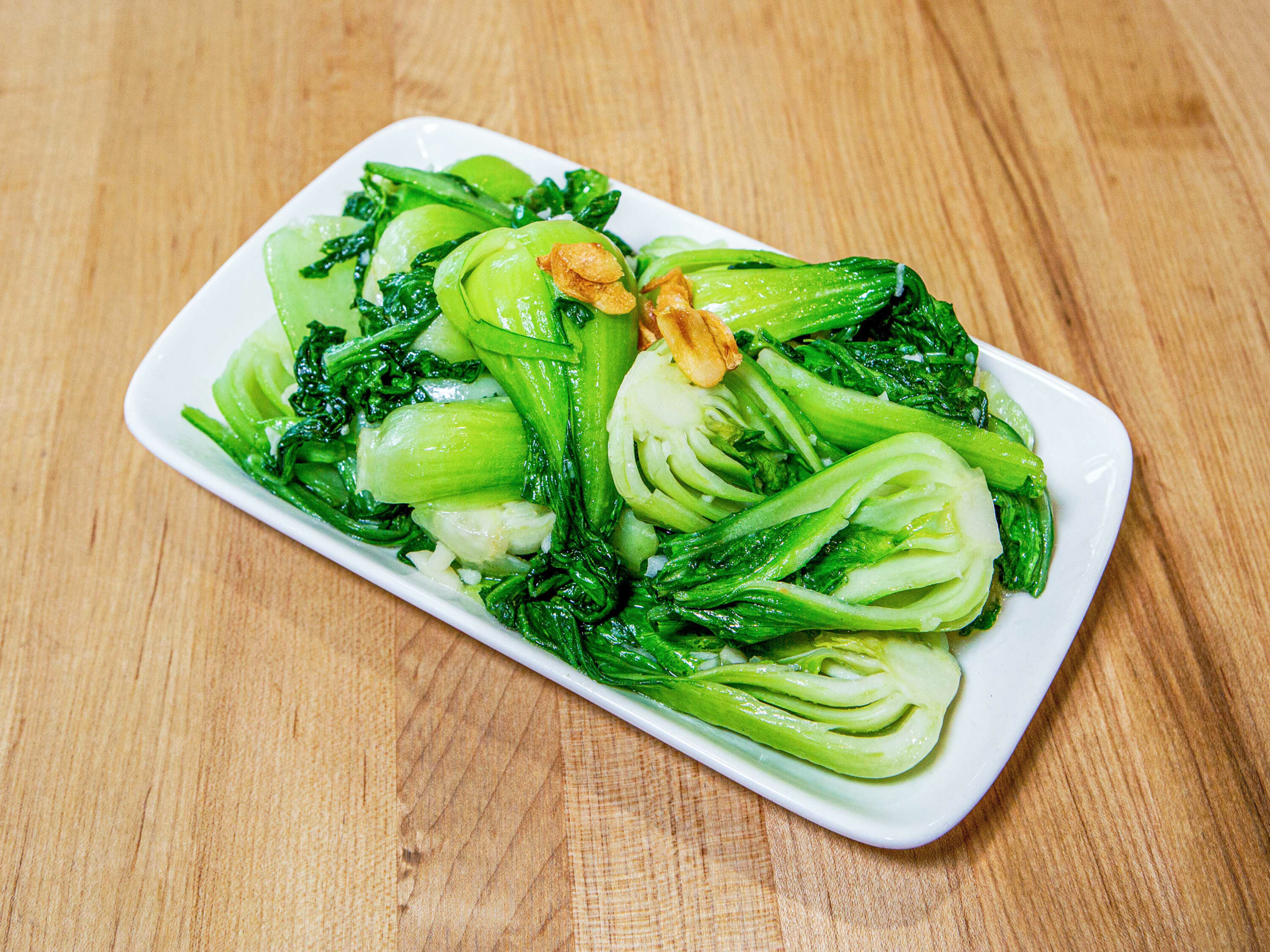 Order sauteed baby bok choy with garlic  food online from Dan Modern Chinese store, Manhattan Beach on bringmethat.com