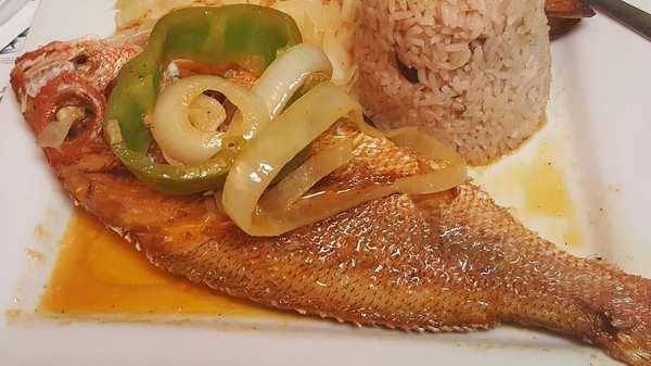 Order Escovitch Fish food online from Trappixx Jamaican Restaurant store, Cherry Hill on bringmethat.com