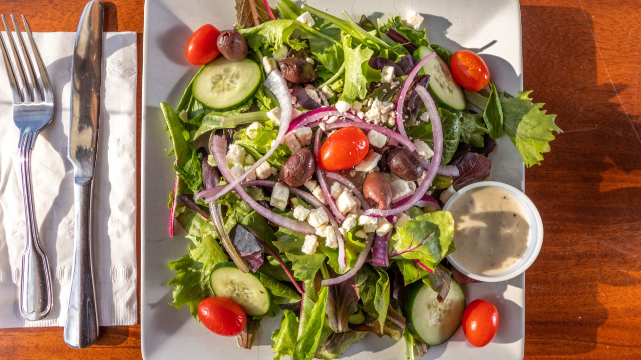 Order Greek Salad food online from Brewed Awakening store, Warwick on bringmethat.com