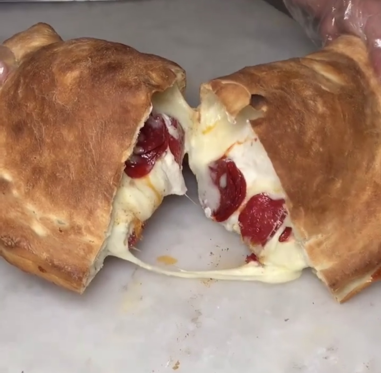 Order Pepperoni Calzone food online from East Village Pizza & Kebabs store, New York on bringmethat.com