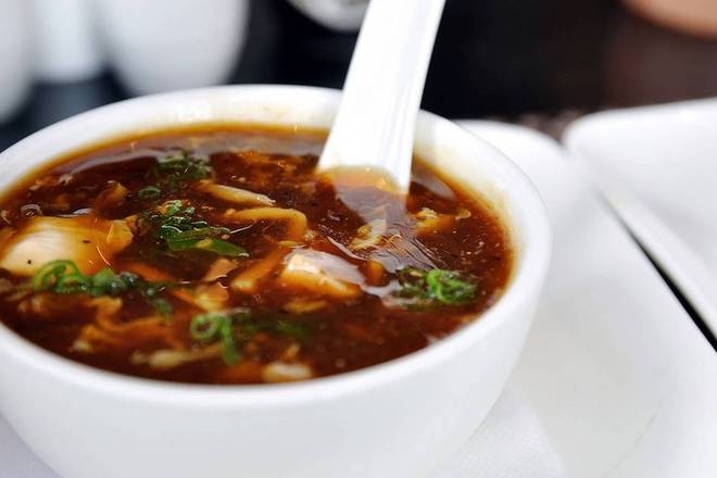Order Hot and Sour Soup 酸辣汤 food online from Koi Fine Asian Cuisine & Lounge store, Evanston on bringmethat.com