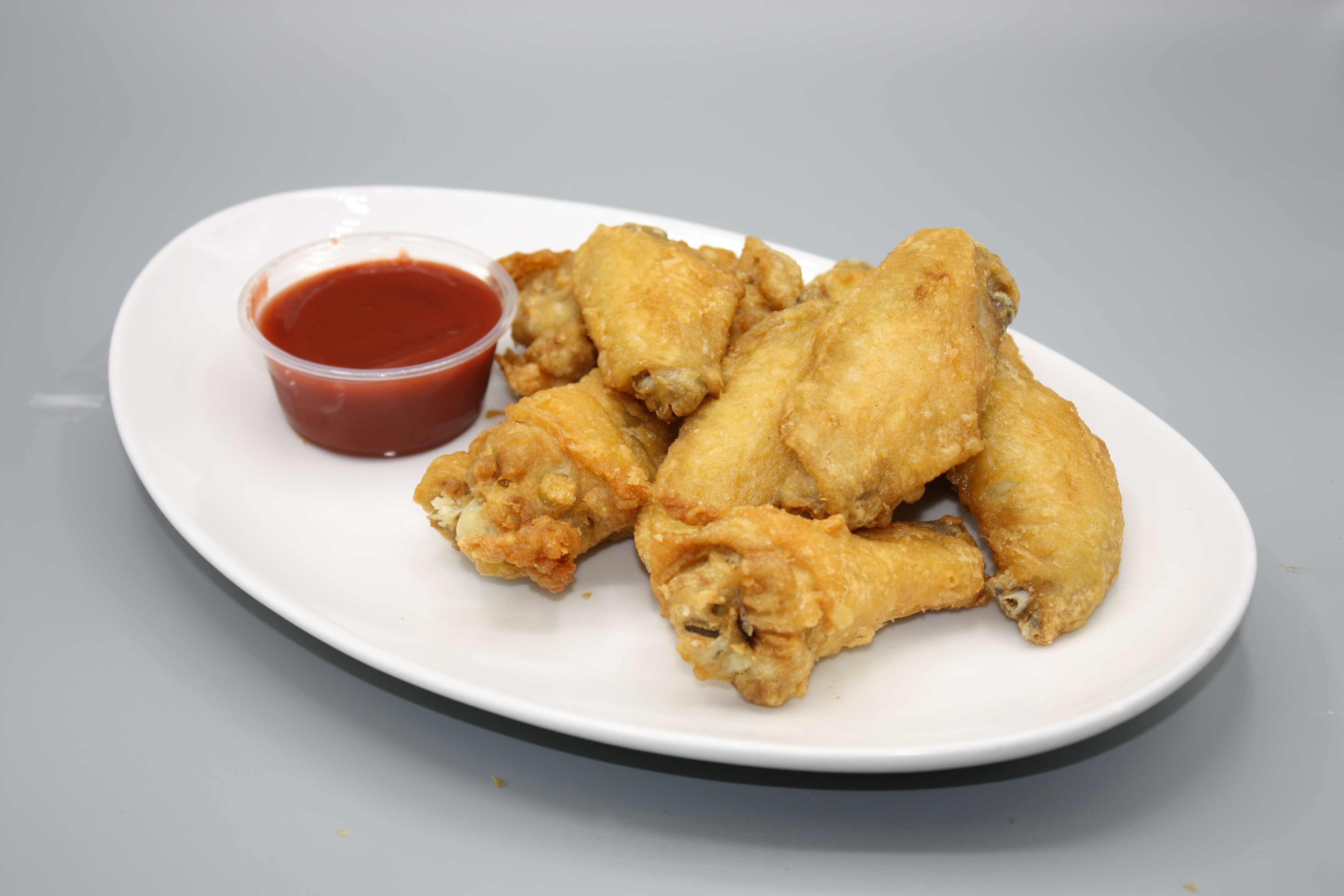 Order 8 Piece Fried Chicken Wings food online from Chau's cafe store, Ashburn on bringmethat.com