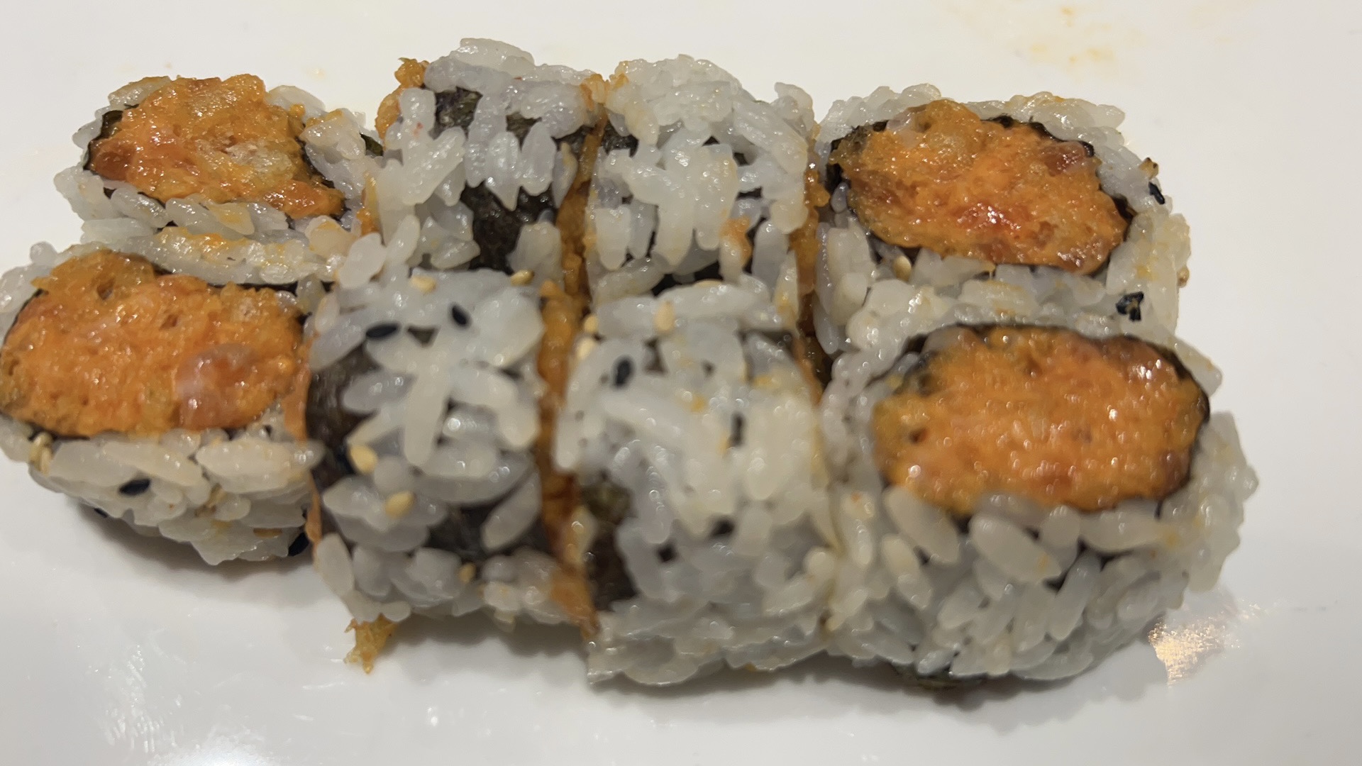 Order F19. Spicy Salmon Roll food online from Soho Sushi store, Grand Rapids on bringmethat.com