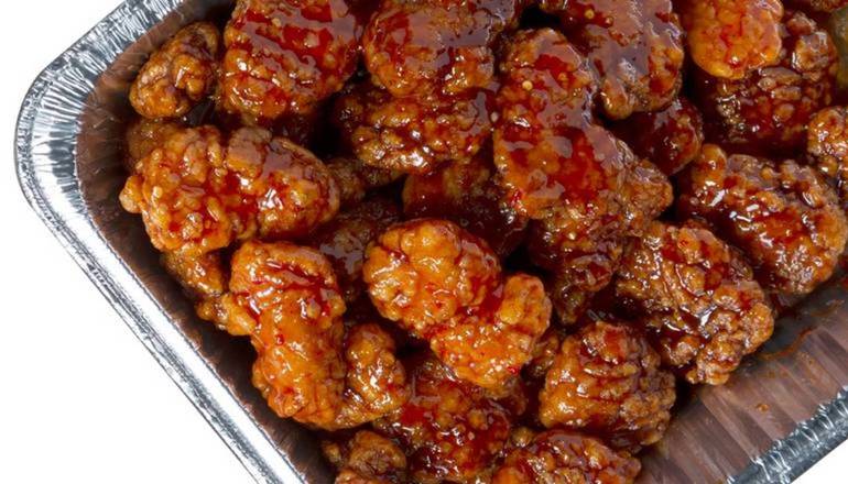 Order 50 Boneless Wings food online from Wing Zone - Athens store, Athens on bringmethat.com