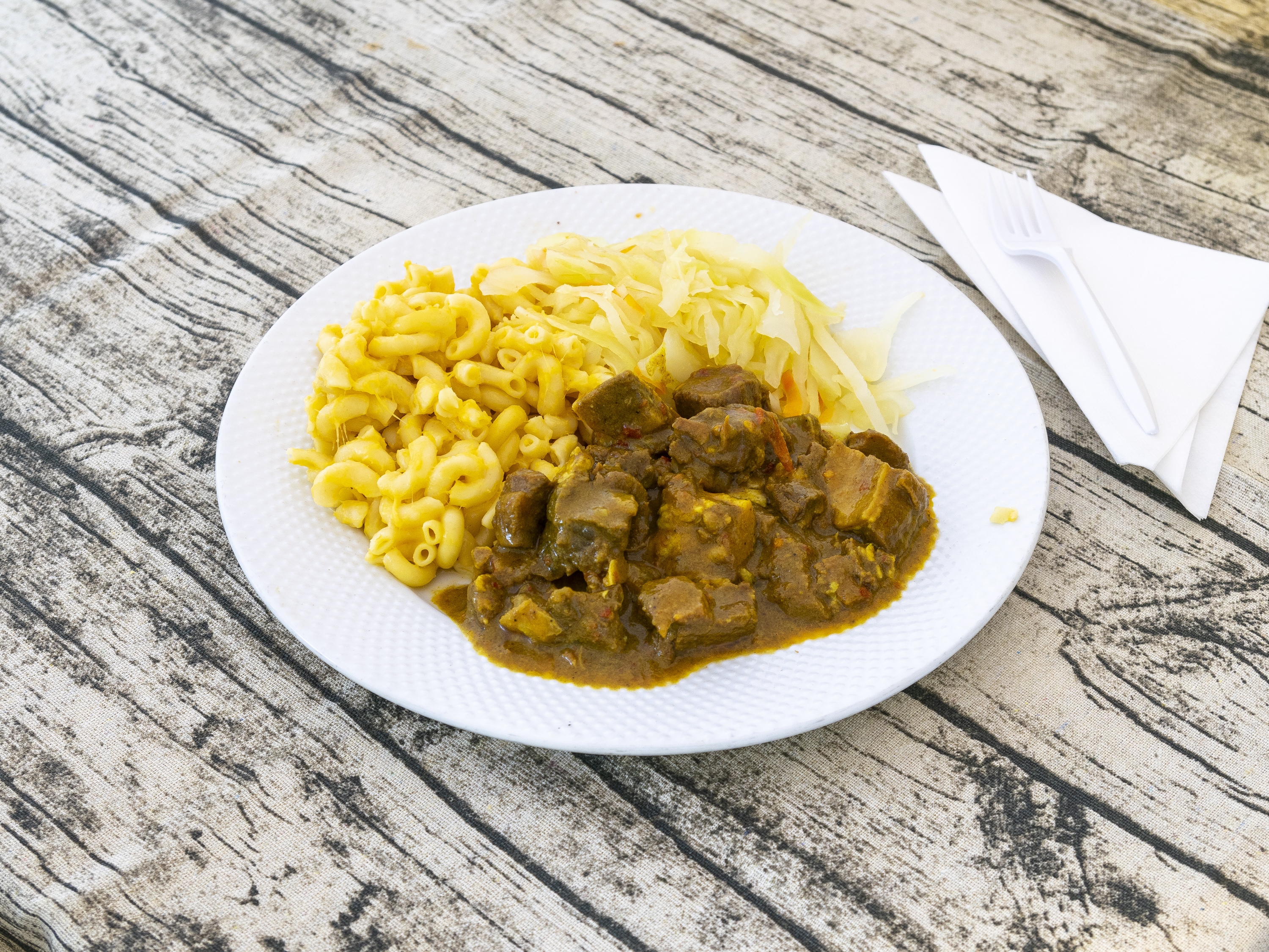 Order Curry Goat food online from K&D Jamaican And American Restaurant store, East Orange on bringmethat.com