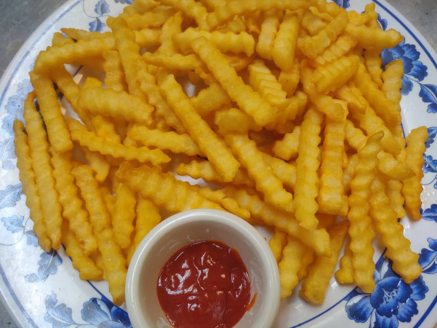 Order A1. French Fries food online from Sam Cafe store, Houston on bringmethat.com
