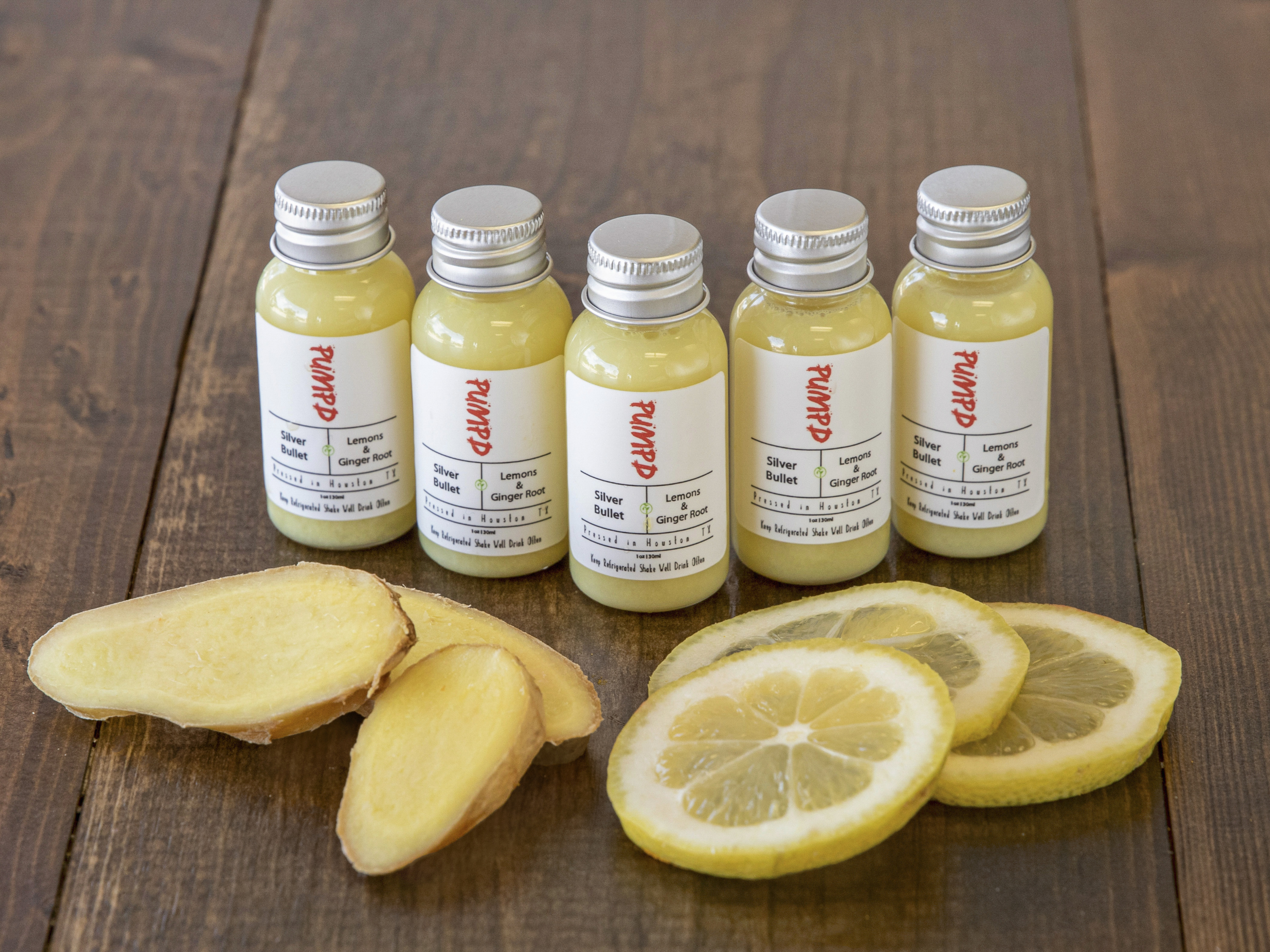 Order Lemon Ginger & Turmeric Shot food online from Pumpd Nutrition store, Houston on bringmethat.com