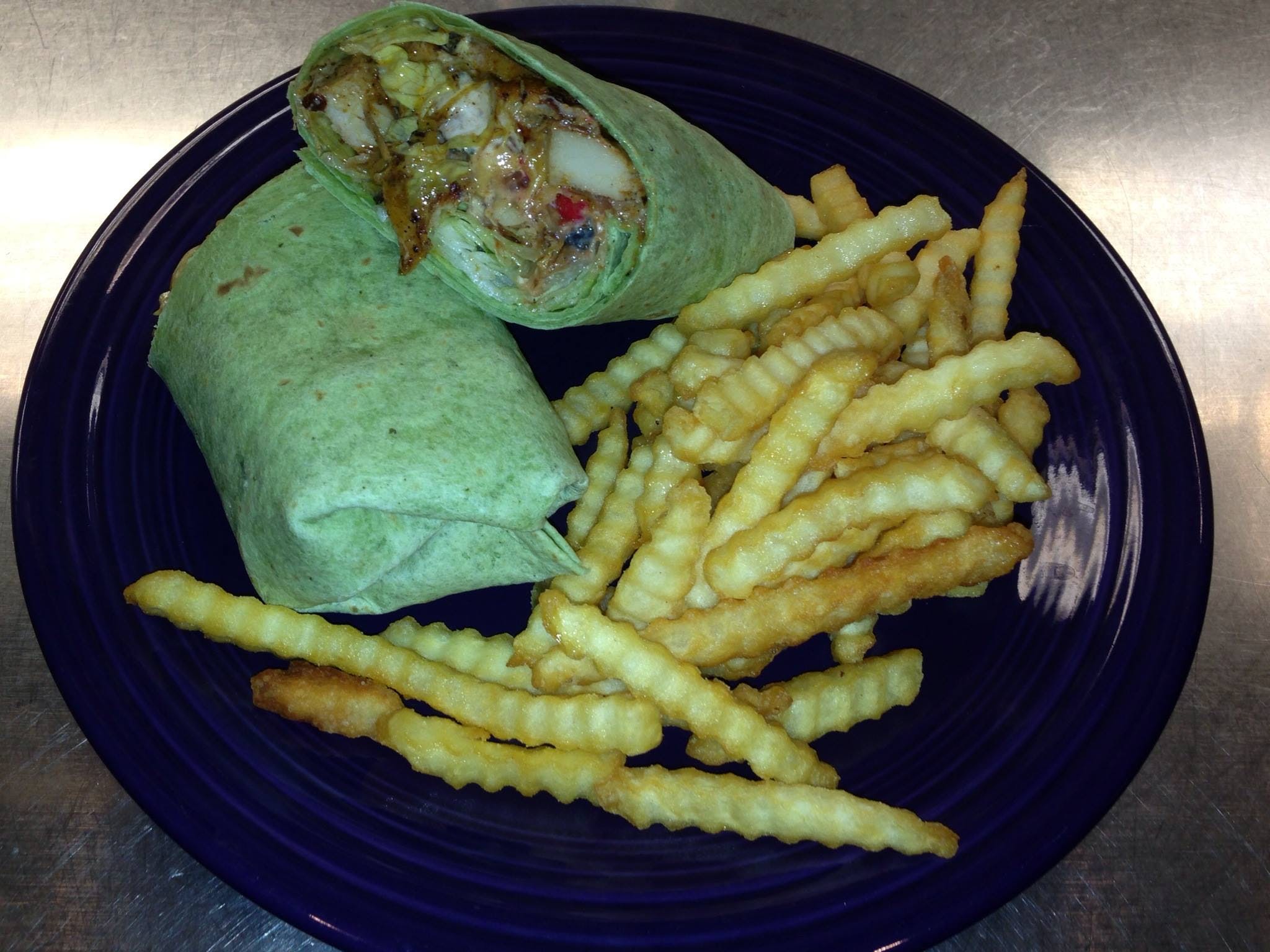 Order Cali Club Wrap - Wrap food online from Varsity Sports Cafe & Roman Coin Pizza store, Omaha on bringmethat.com