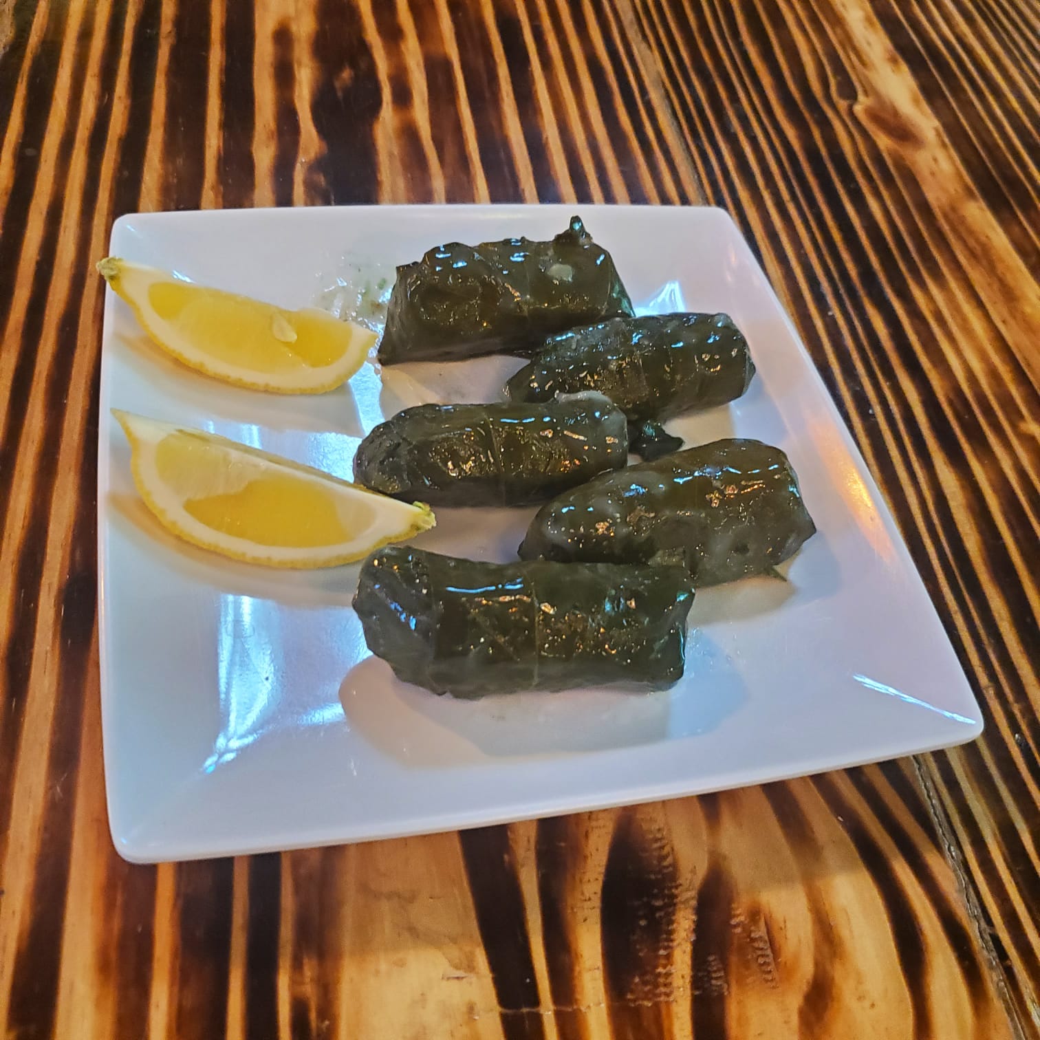 Order 4. Dolma food online from Mosaic Cafe Eatery store, Virginia Beach on bringmethat.com