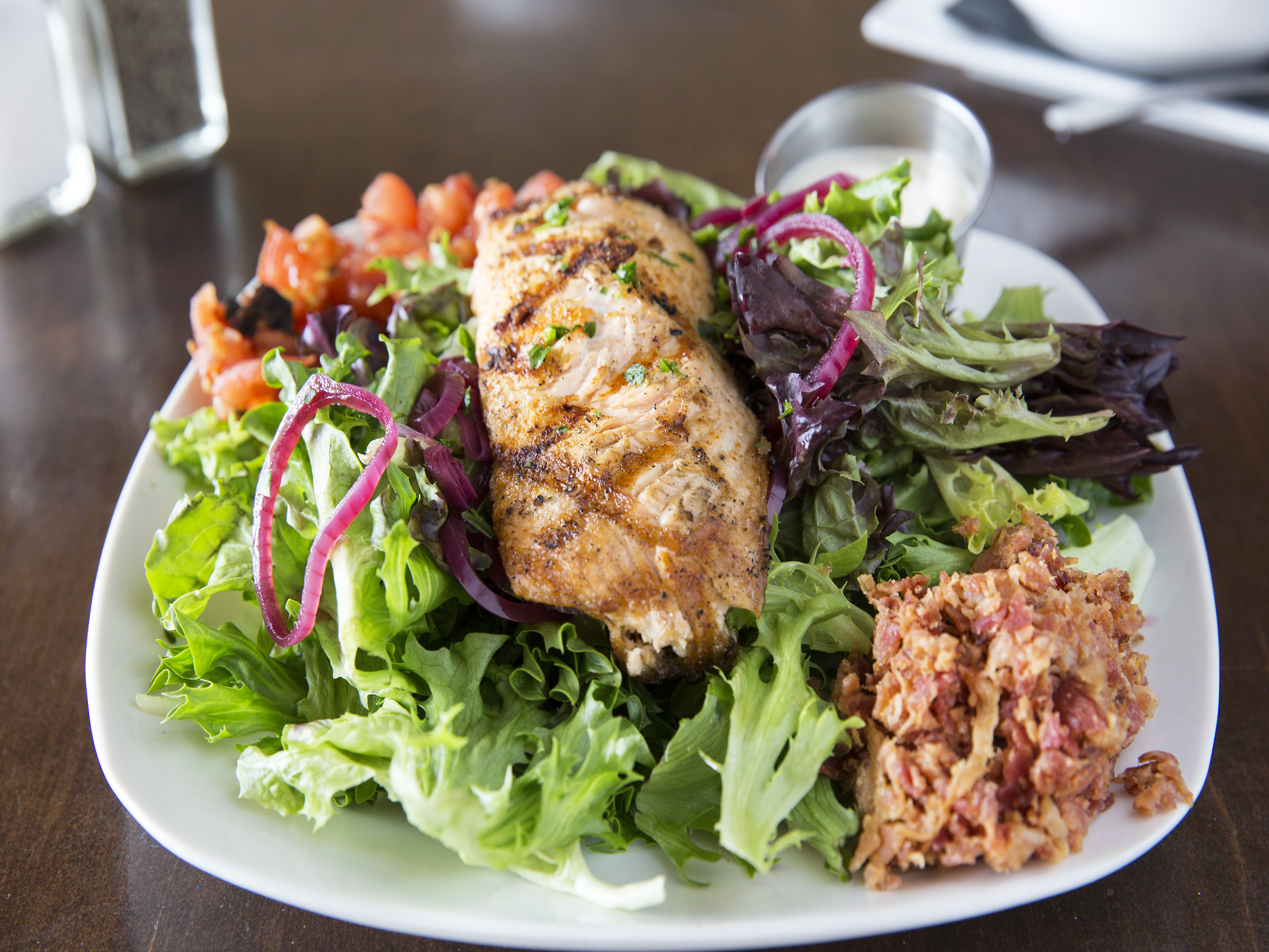 Order Grilled Salmon Salad food online from Barrelhouse Pub and Grill store, Garden City on bringmethat.com