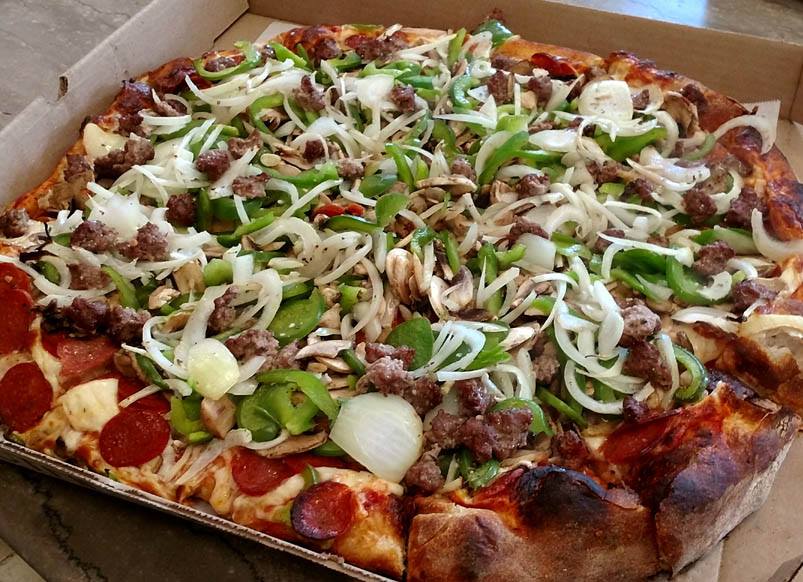 Order 4 Toppings Pizza food online from Pizza Joint store, Portland on bringmethat.com