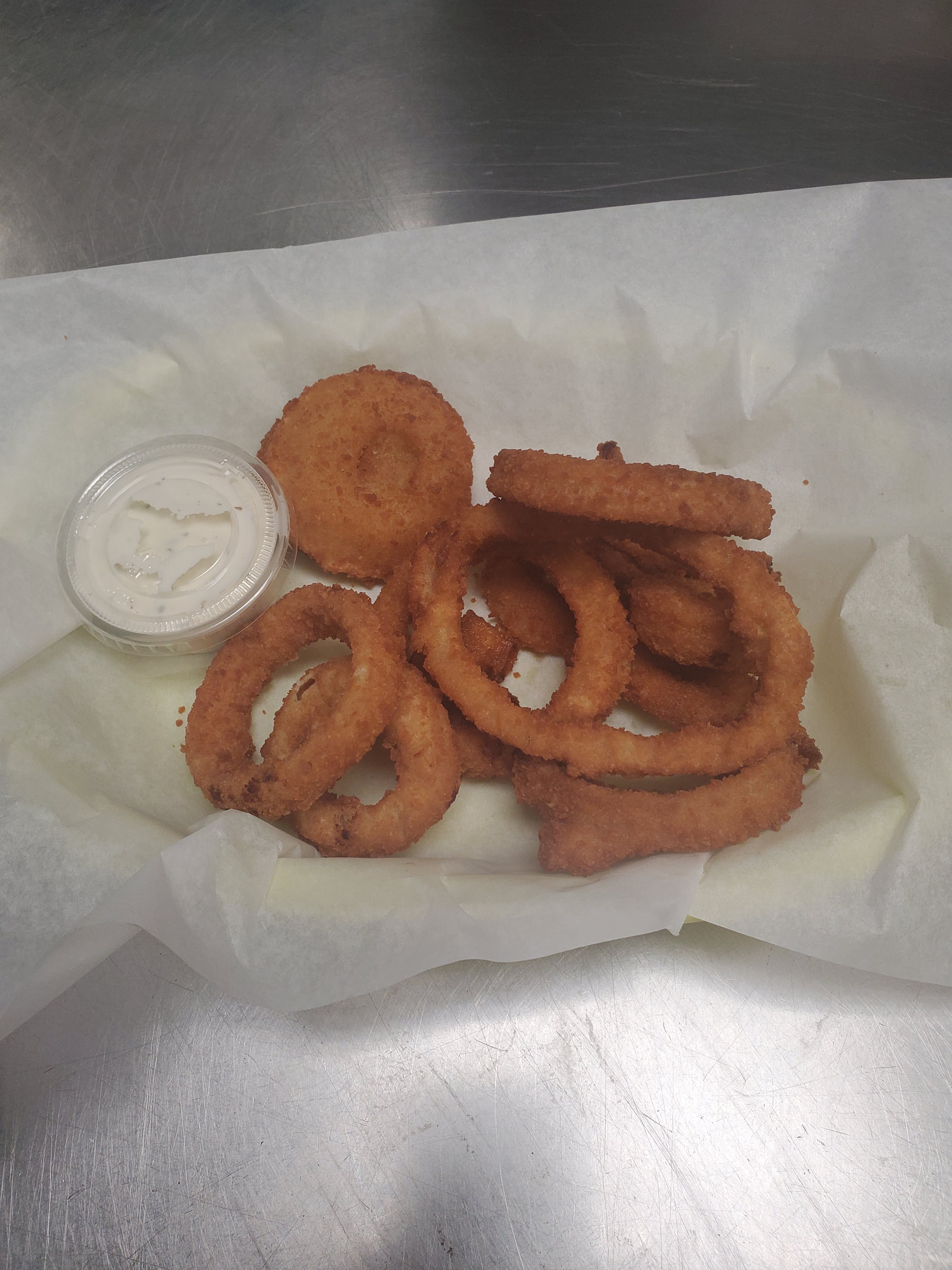 Order Onion Rings - Appetizer food online from Pizza Cucina store, Oswego on bringmethat.com