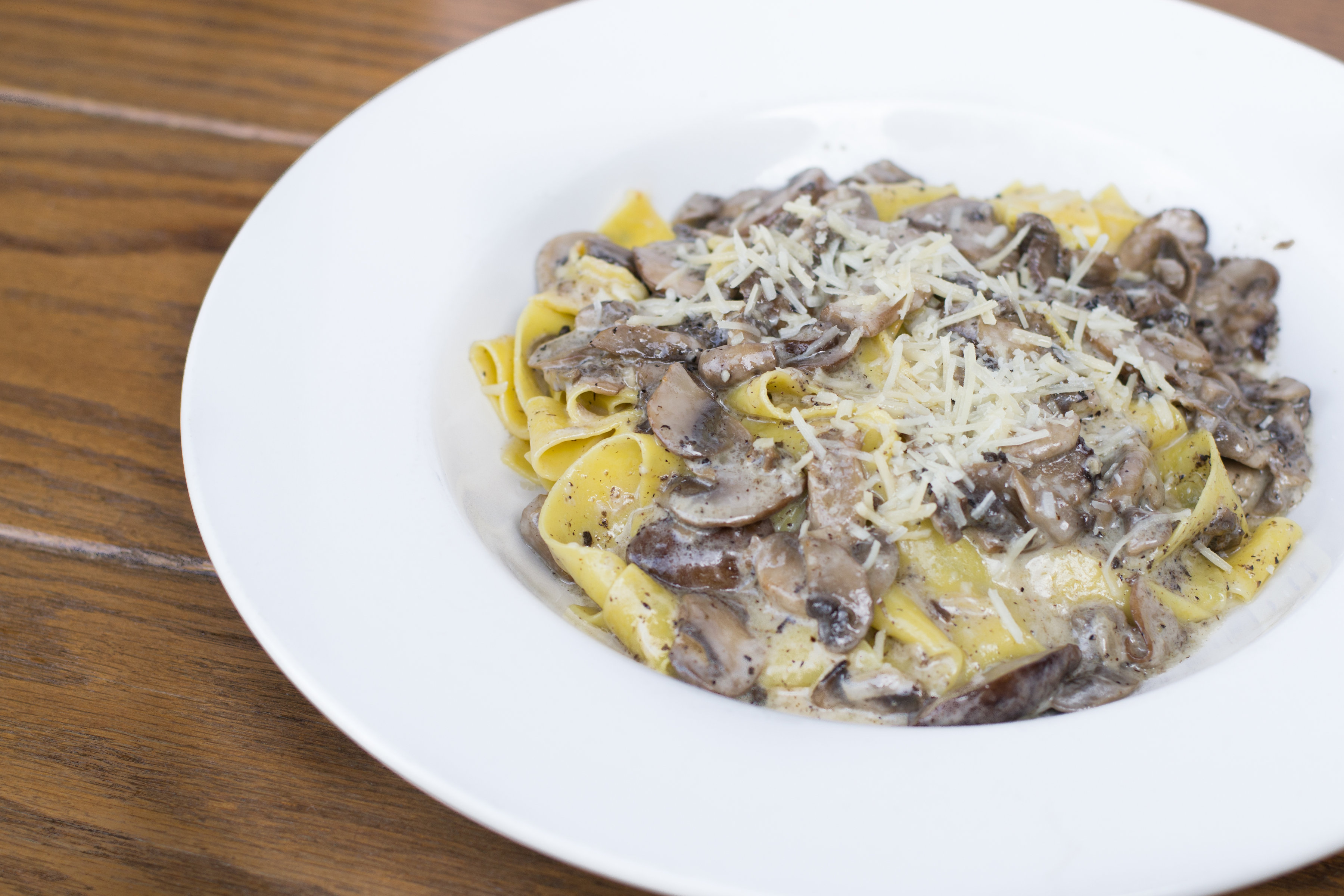 Order Pappardelle Funghi food online from Al Forno Caffe store, Costa Mesa on bringmethat.com