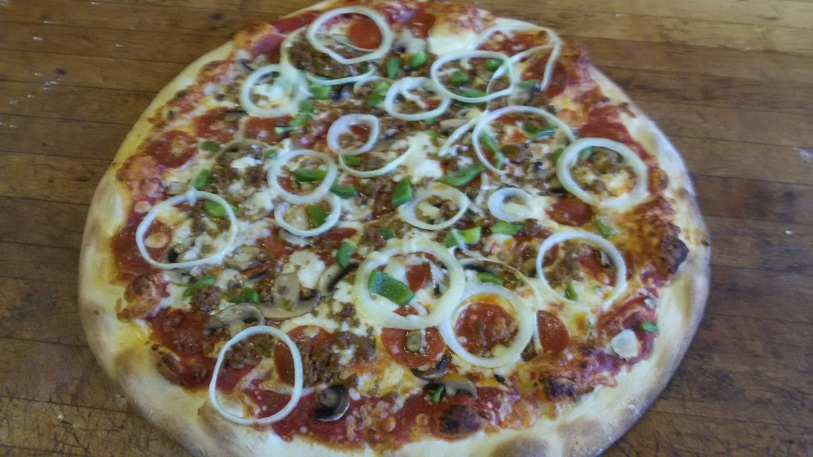 Order Hurricane Pizza food online from Mojo Pizza & Pub store, Decatur on bringmethat.com