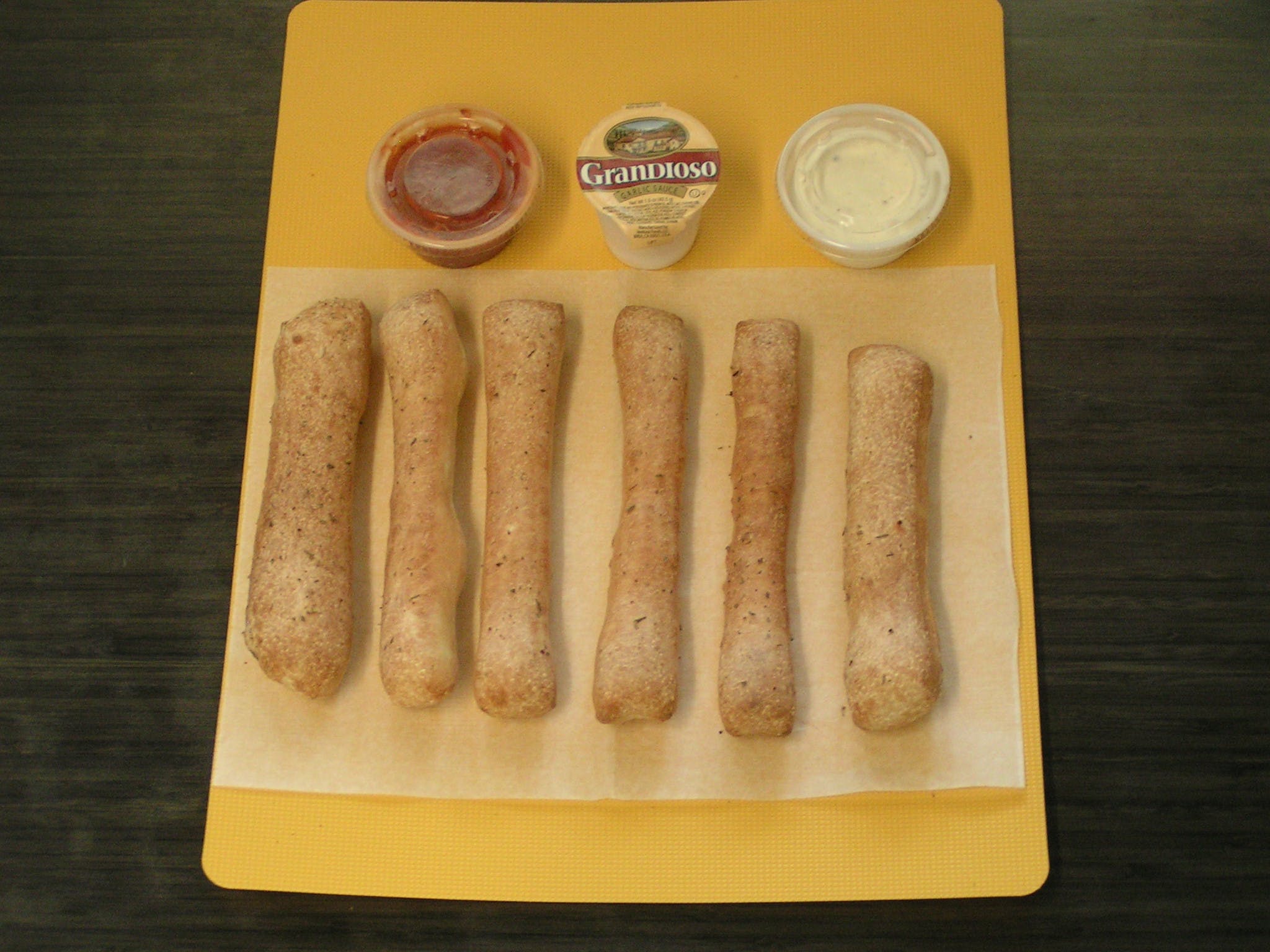 Order BREAD STICKS - 6 Pieces food online from Pepperinos Pizza store, Lewistown on bringmethat.com